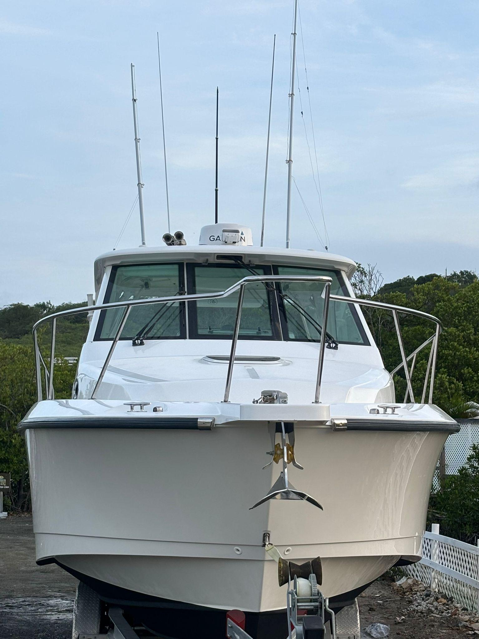 Boston Whaler-345 Conquest 2012 -PR-2012 Boston Whaler 345 Conquest boat docked, front view.-9446483 | Thumbnail