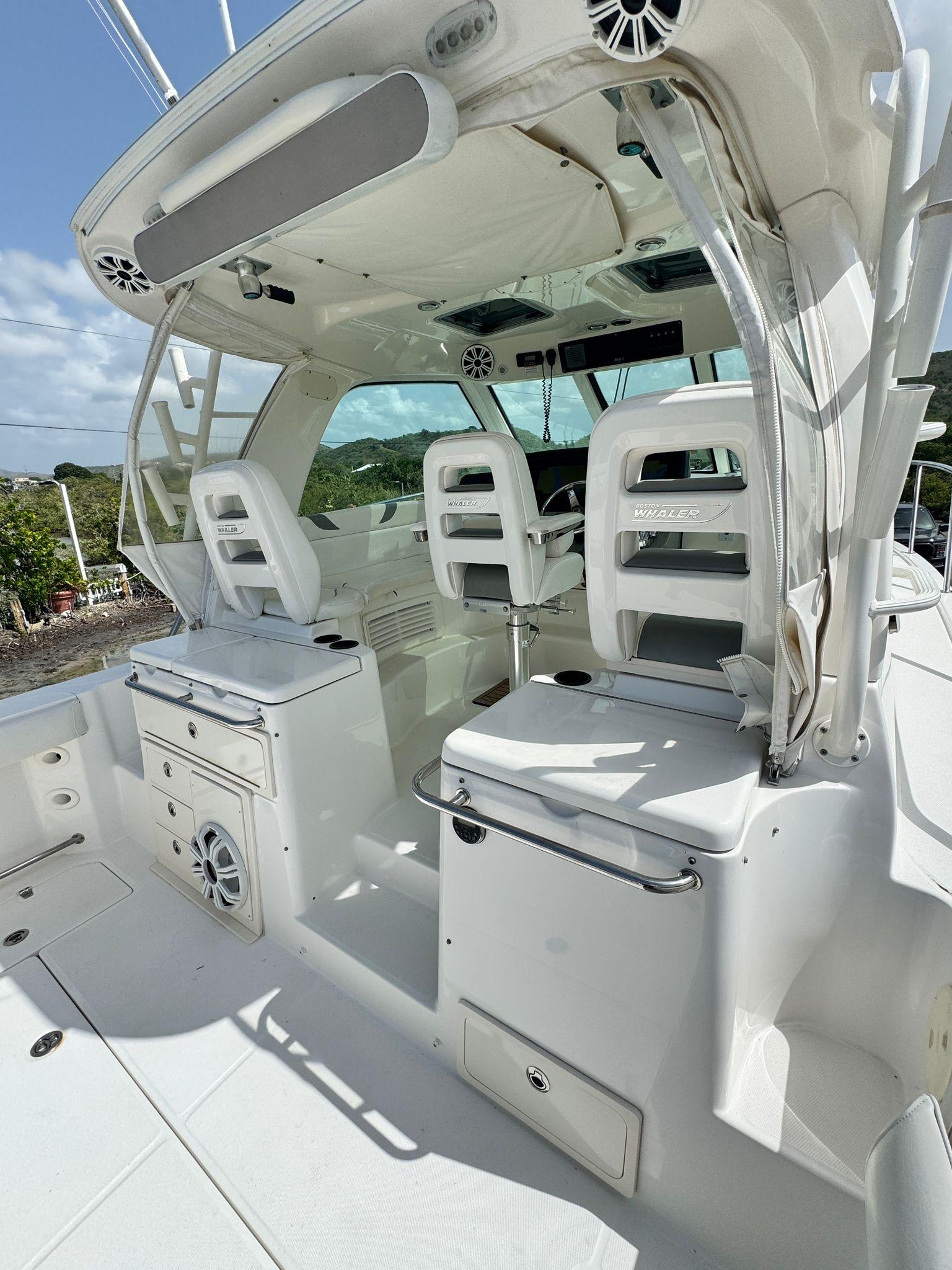 Boston Whaler-345 Conquest 2012 -PR-2012 Boston Whaler 345 Conquest cockpit with white seating and control panel.-9446483 | Thumbnail