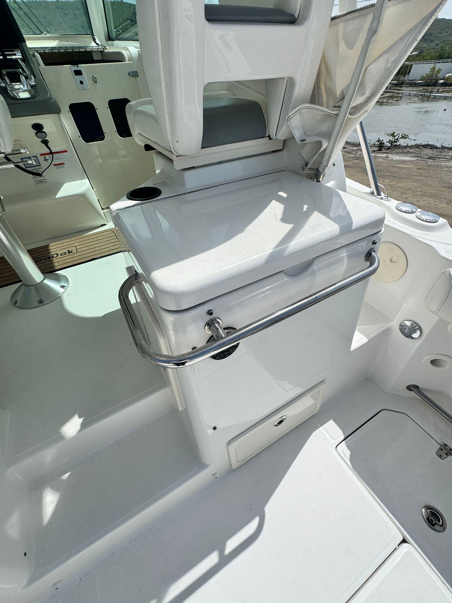 Boston Whaler-345 Conquest 2012 -PR-2012 Boston Whaler 345 Conquest boat interior with white seating and storage.-9446483 | Thumbnail