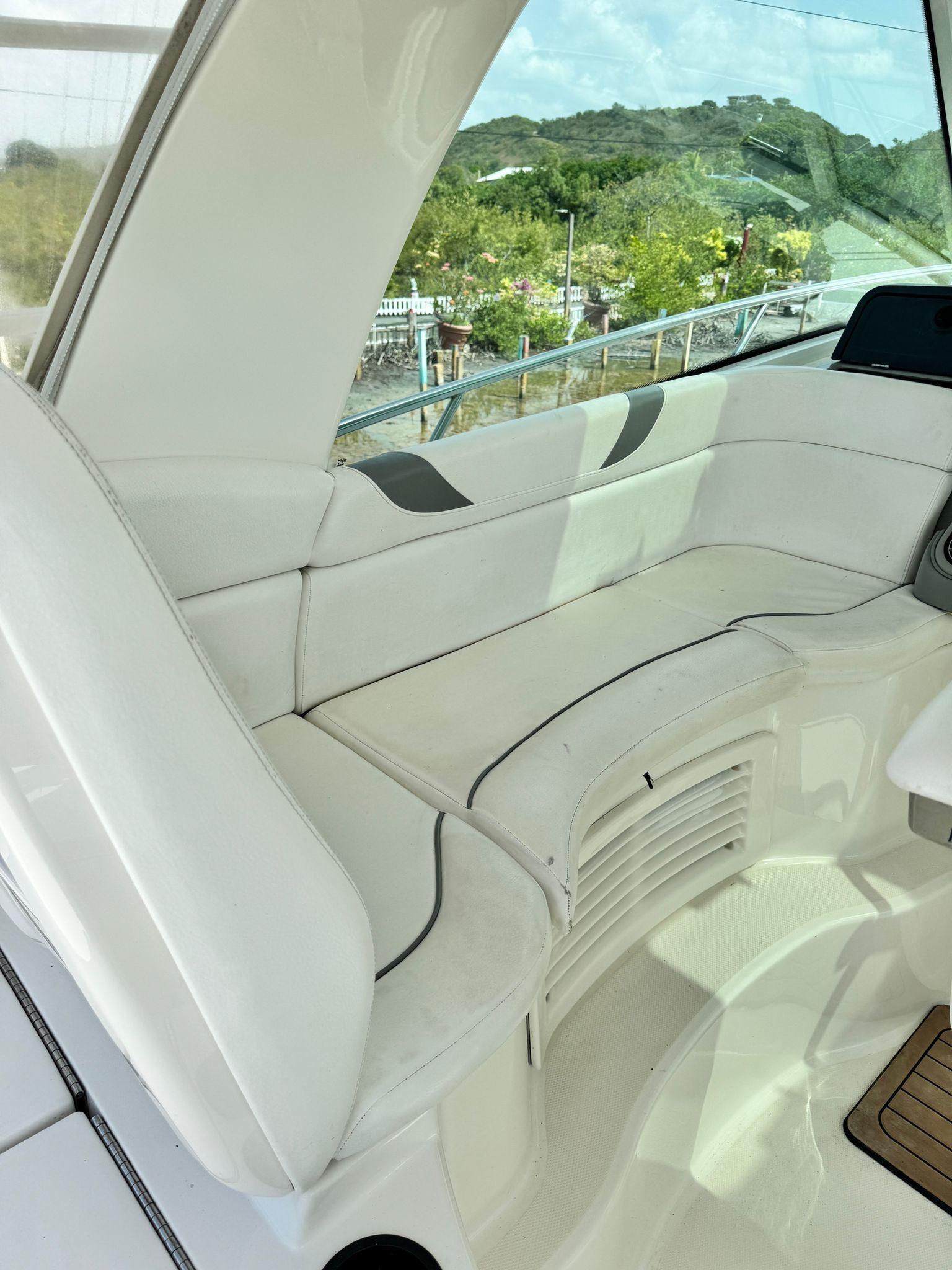 Boston Whaler-345 Conquest 2012 -PR-2012 Boston Whaler 345 Conquest boat interior with white cushioned seating.-9446483 | Thumbnail