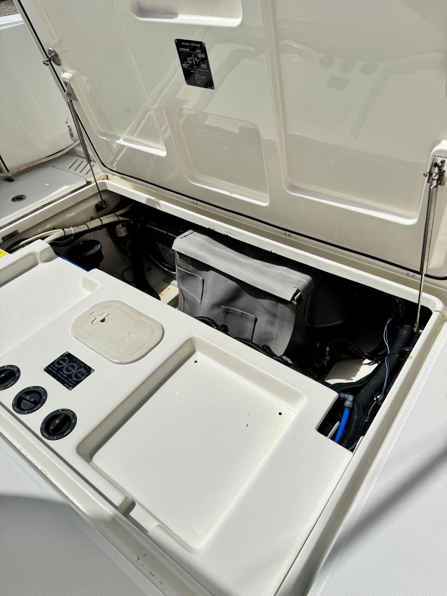 Boston Whaler-345 Conquest 2012 -PR-2012 Boston Whaler 345 Conquest engine compartment with open hatch.-9446483 | Thumbnail