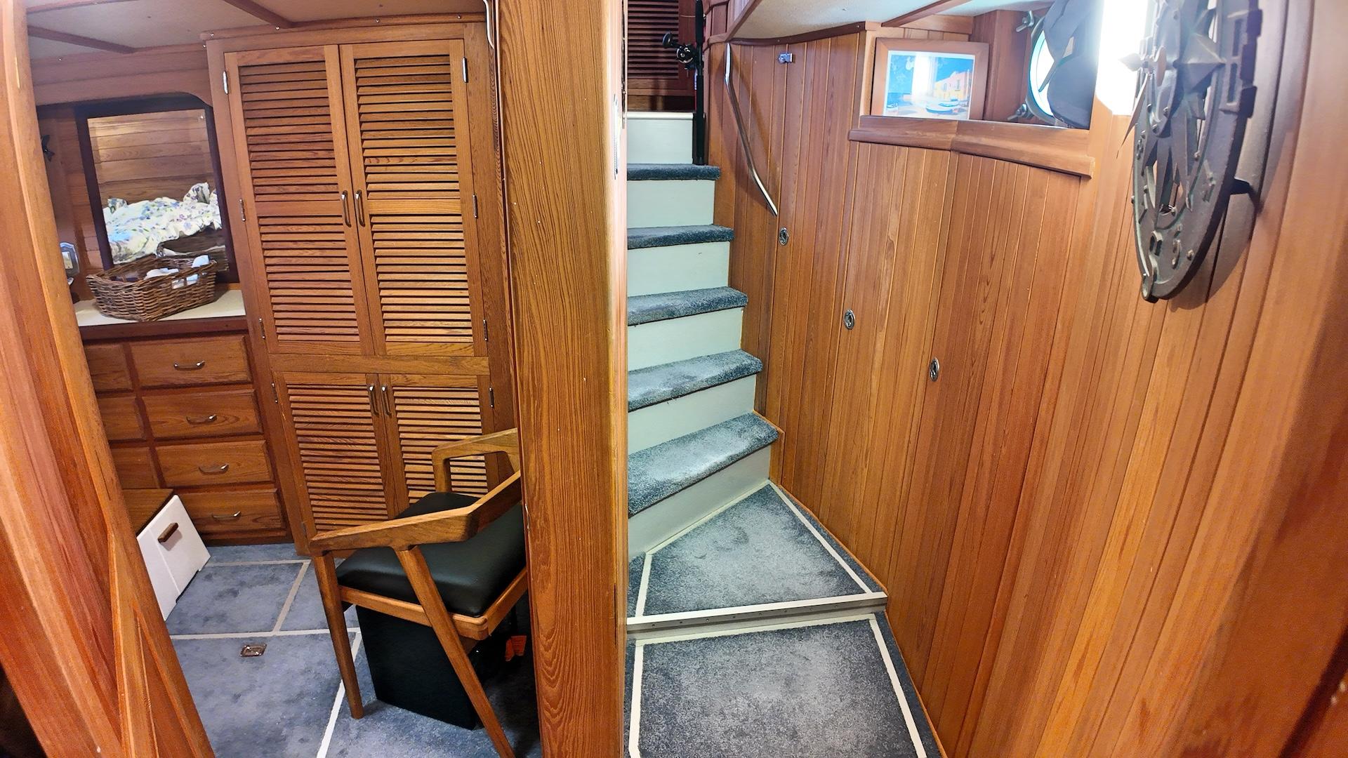 Custom-Holland Marine 50 Custom Trawler 1993-La Vita Marina SC-US-Interior of 1993 Holland Marine 50 Custom Trawler with wooden paneling and carpeted stairs.-9816492 | Thumbnail