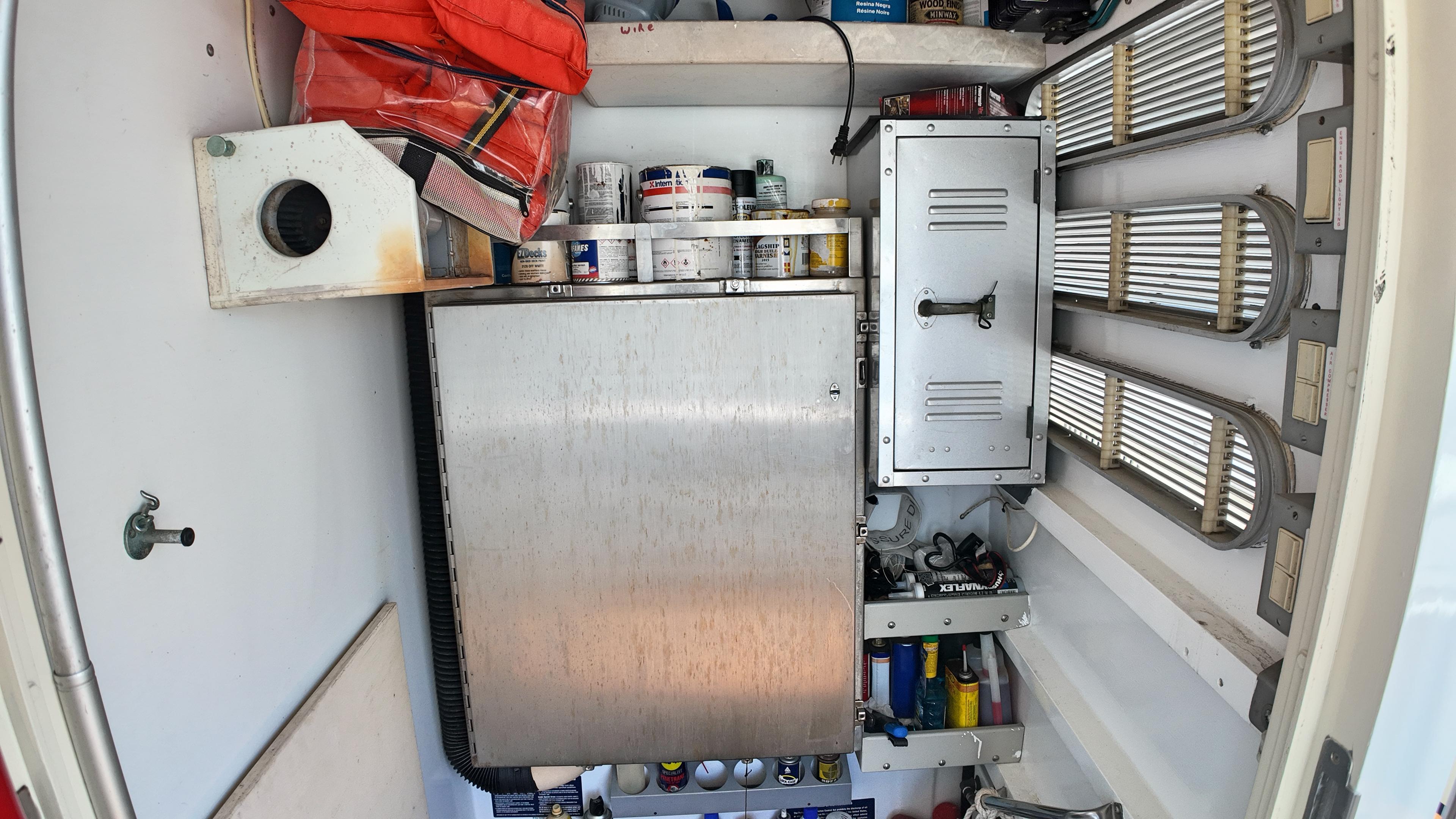 Custom-Holland Marine 50 Custom Trawler 1993-La Vita Marina SC-US-Storage area in a 1993 Holland Marine 50 Custom Trawler with equipment and supplies.-9816492 | Thumbnail