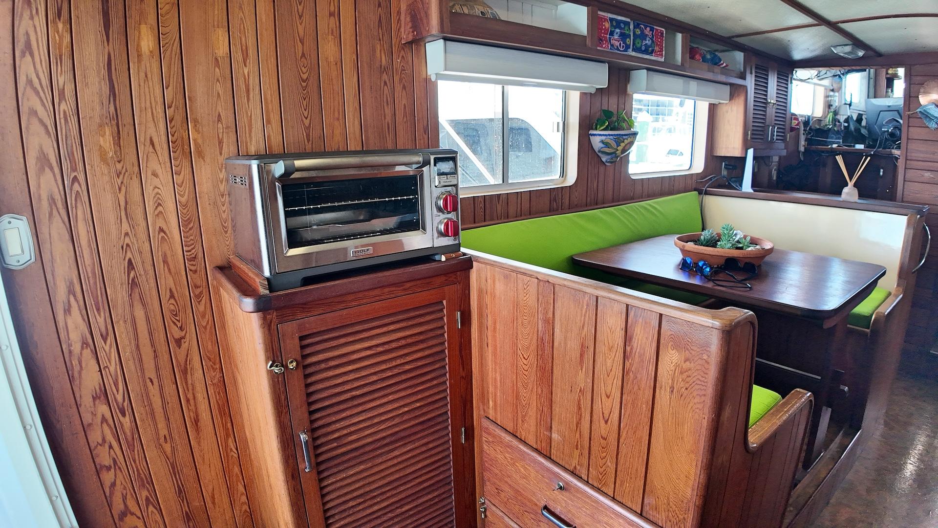 Custom-Holland Marine 50 Custom Trawler 1993-La Vita Marina SC-US-Interior of 1993 Holland Marine 50 Custom Trawler with wood paneling and dining area.-9816492 | Thumbnail