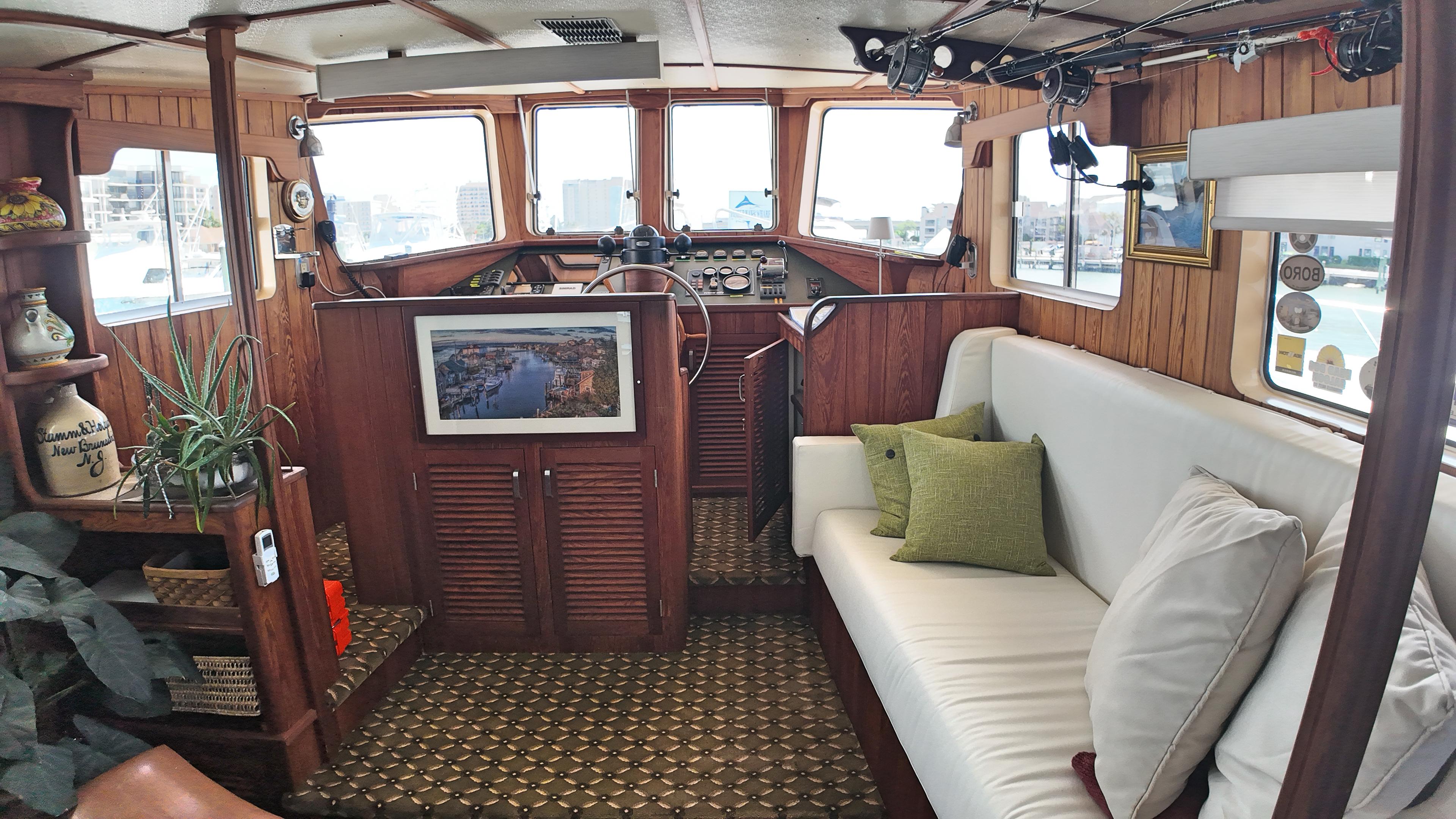 Custom-Holland Marine 50 Custom Trawler 1993-La Vita Marina SC-US-Interior of 1993 Holland Marine 50 Custom Trawler with wooden decor and cozy seating.-9816492 | Thumbnail
