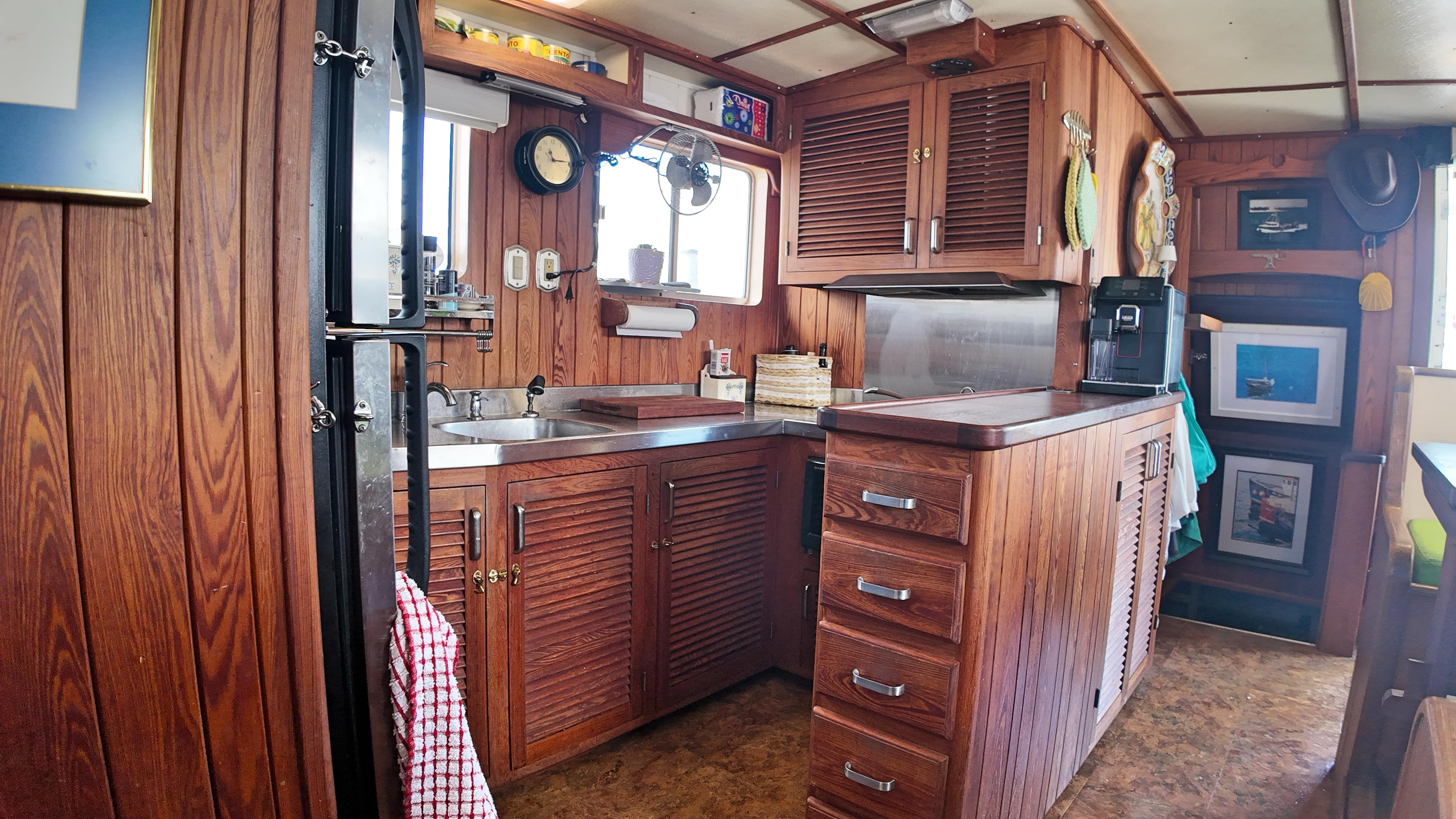 Custom-Holland Marine 50 Custom Trawler 1993-La Vita Marina SC-US-Interior of 1993 Holland Marine 50 Custom Trawler with wooden cabinetry and nautical decor.-9816492 | Thumbnail