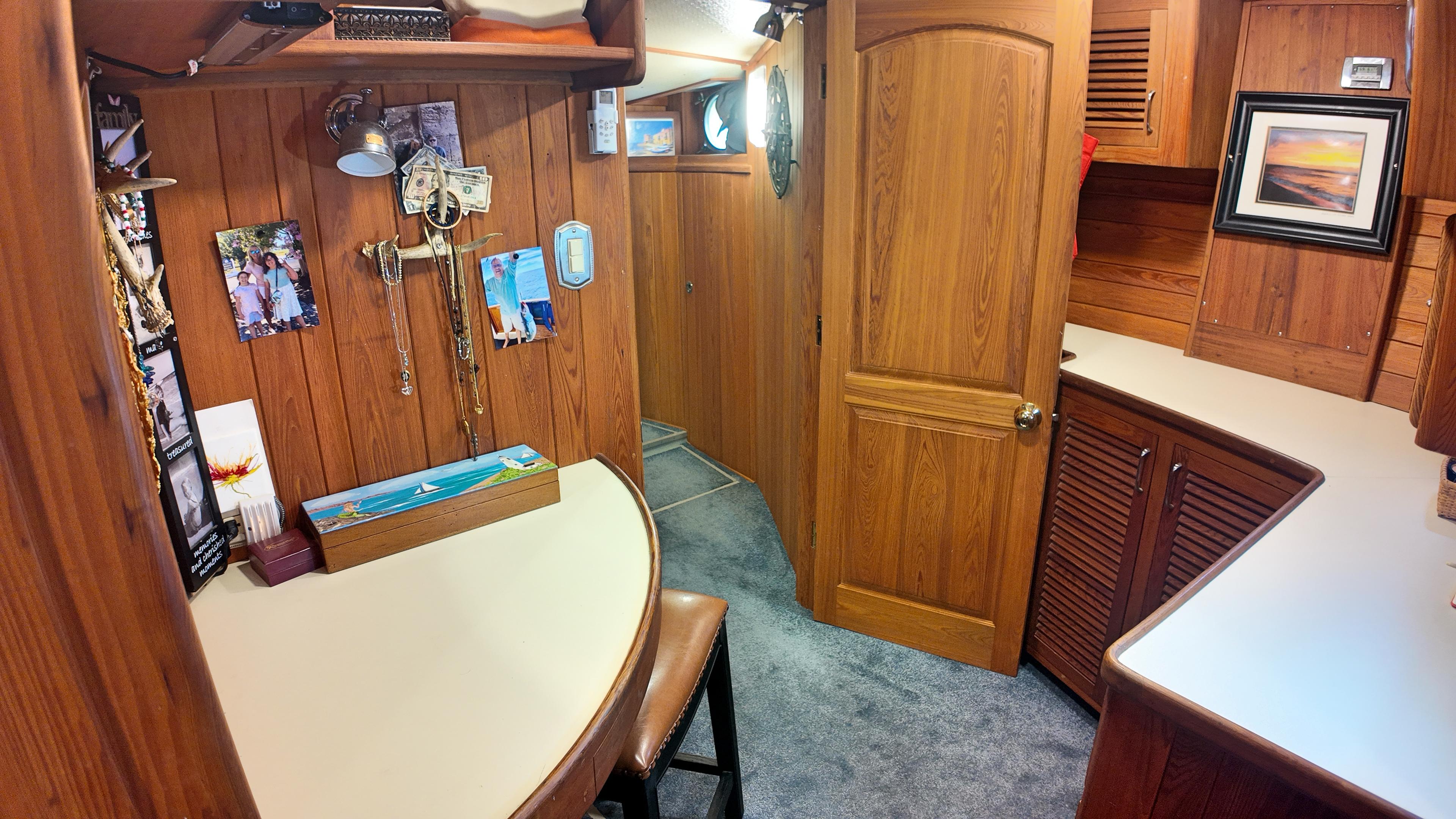 Custom-Holland Marine 50 Custom Trawler 1993-La Vita Marina SC-US-Interior of 1993 Holland Marine 50 Custom Trawler with wood paneling and desk area.-9816492 | Thumbnail