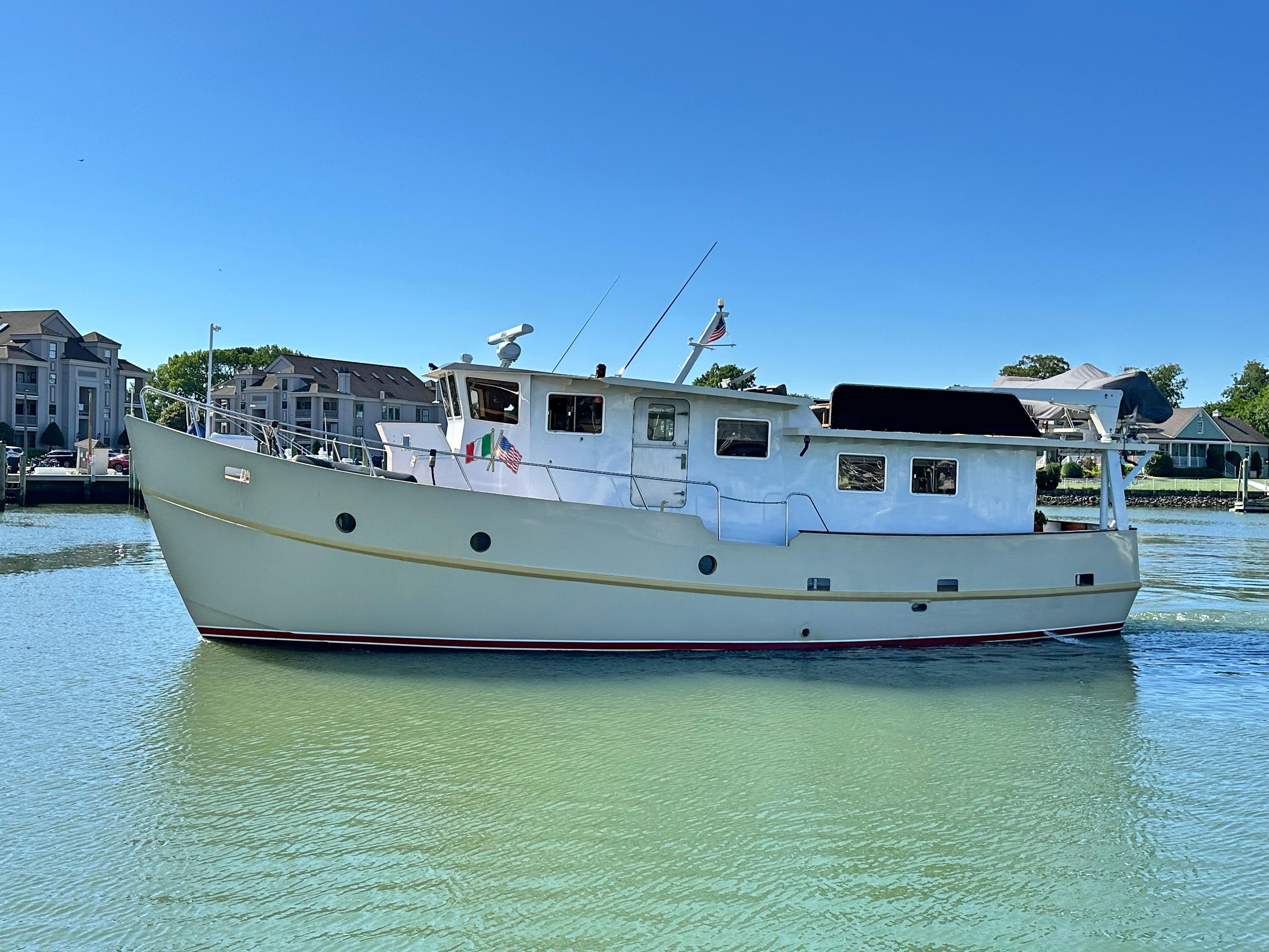 Custom-Holland Marine 50 Custom Trawler 1993-La Vita Marina SC-US-Custom Holland Marine 50 Trawler, 1993, docked in calm waters under clear blue sky.-9816492 | Thumbnail
