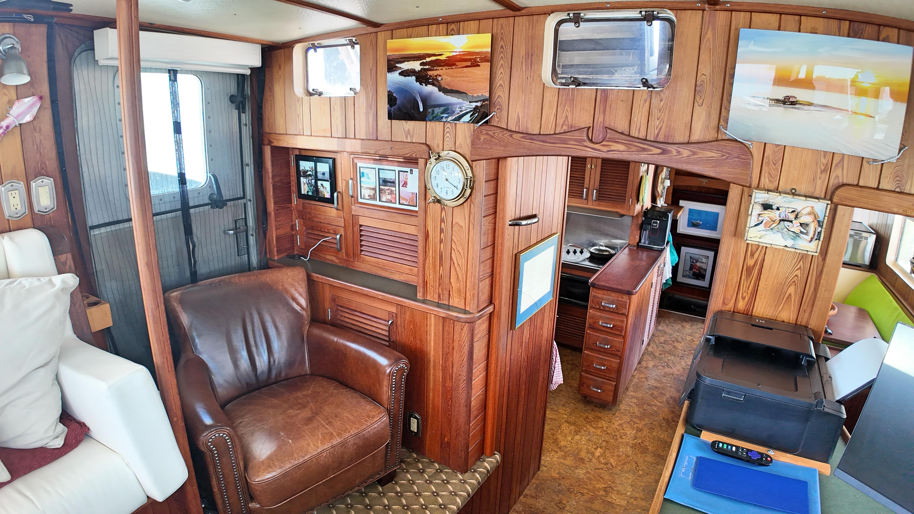 Custom-Holland Marine 50 Custom Trawler 1993-La Vita Marina SC-US-Interior of 1993 Holland Marine 50 Custom Trawler with wood paneling and leather chair.-9816492 | Thumbnail