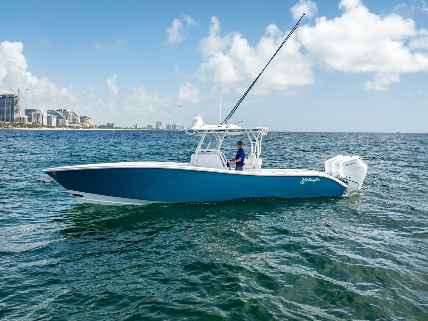 Yellowfin-34 Offshore 2025-34 Offshore FL-US-2025 Yellowfin 34 Offshore boat cruising on open water under a clear sky.-9806499 | Thumbnail