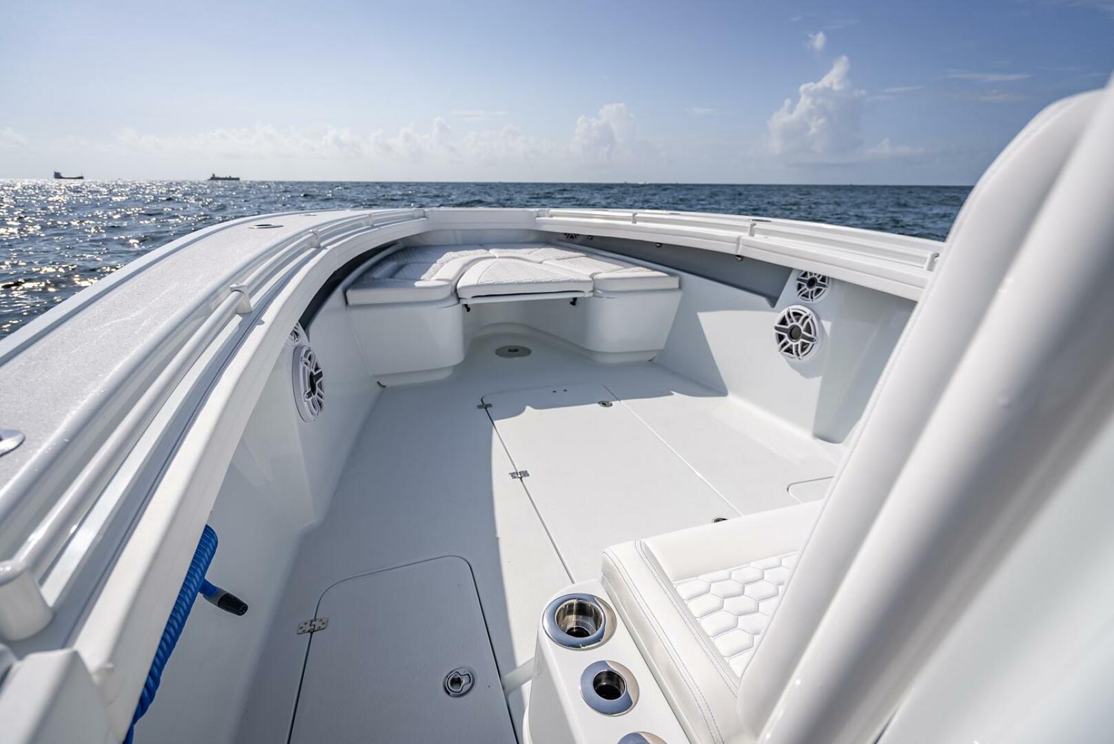 Yellowfin-34 Offshore 2025-34 Offshore FL-US-2025 Yellowfin 34 Offshore boat interior with seating, ocean view, and clear sky.-9806499 | Thumbnail