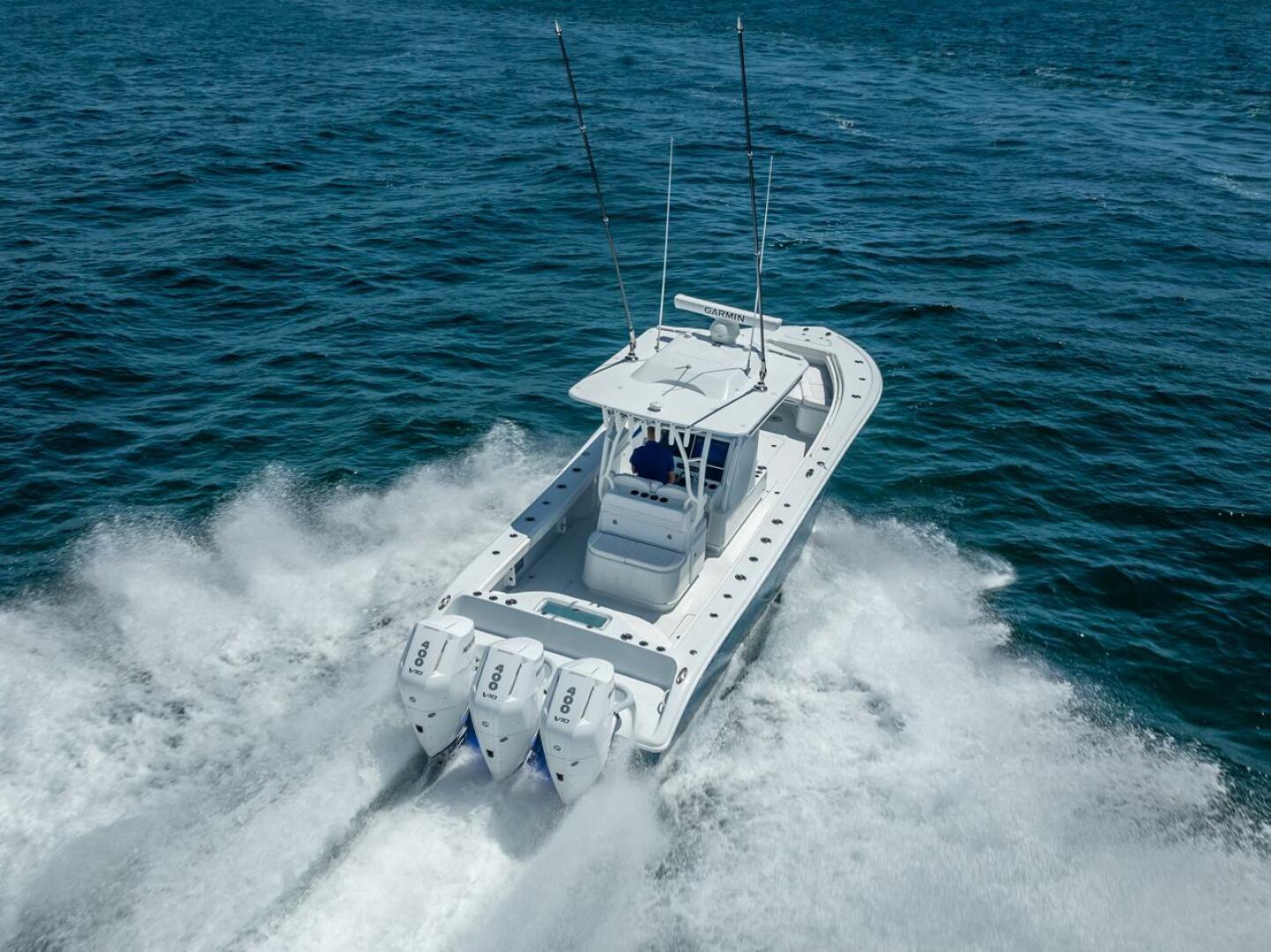 Yellowfin-34 Offshore 2025-34 Offshore FL-US-2025 Yellowfin 34 Offshore boat speeding on ocean waters.-9806499 | Thumbnail