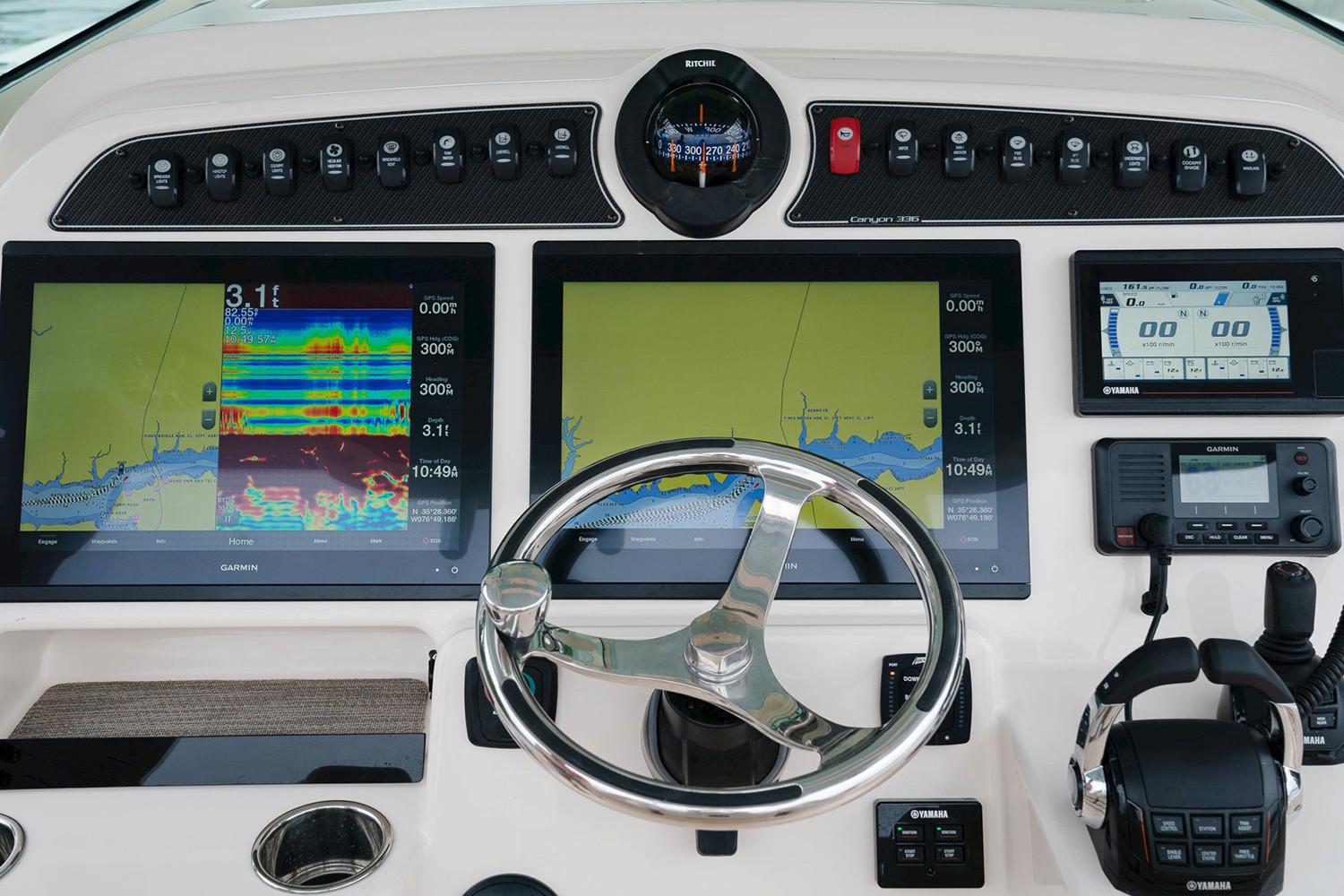 Manufacturer Provided Image: Grady-White Canyon 336 2020 boat dashboard with navigation and control systems.