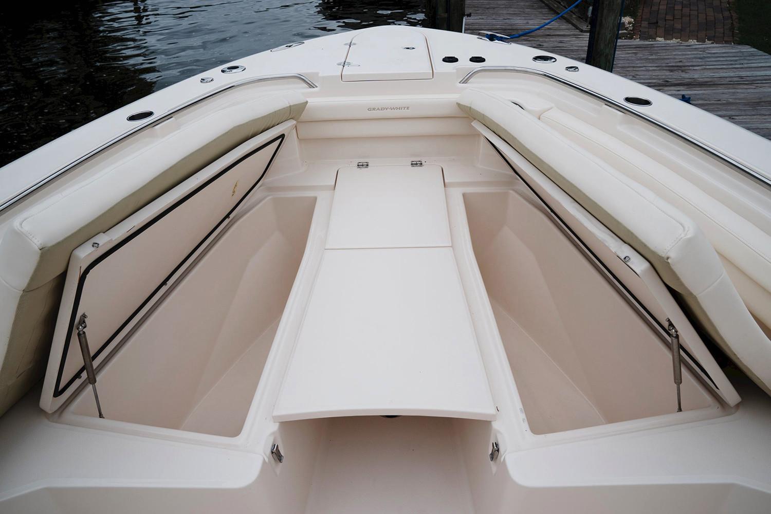 Manufacturer Provided Image: 2020 Grady-White Canyon 336 boat bow with open storage compartments.