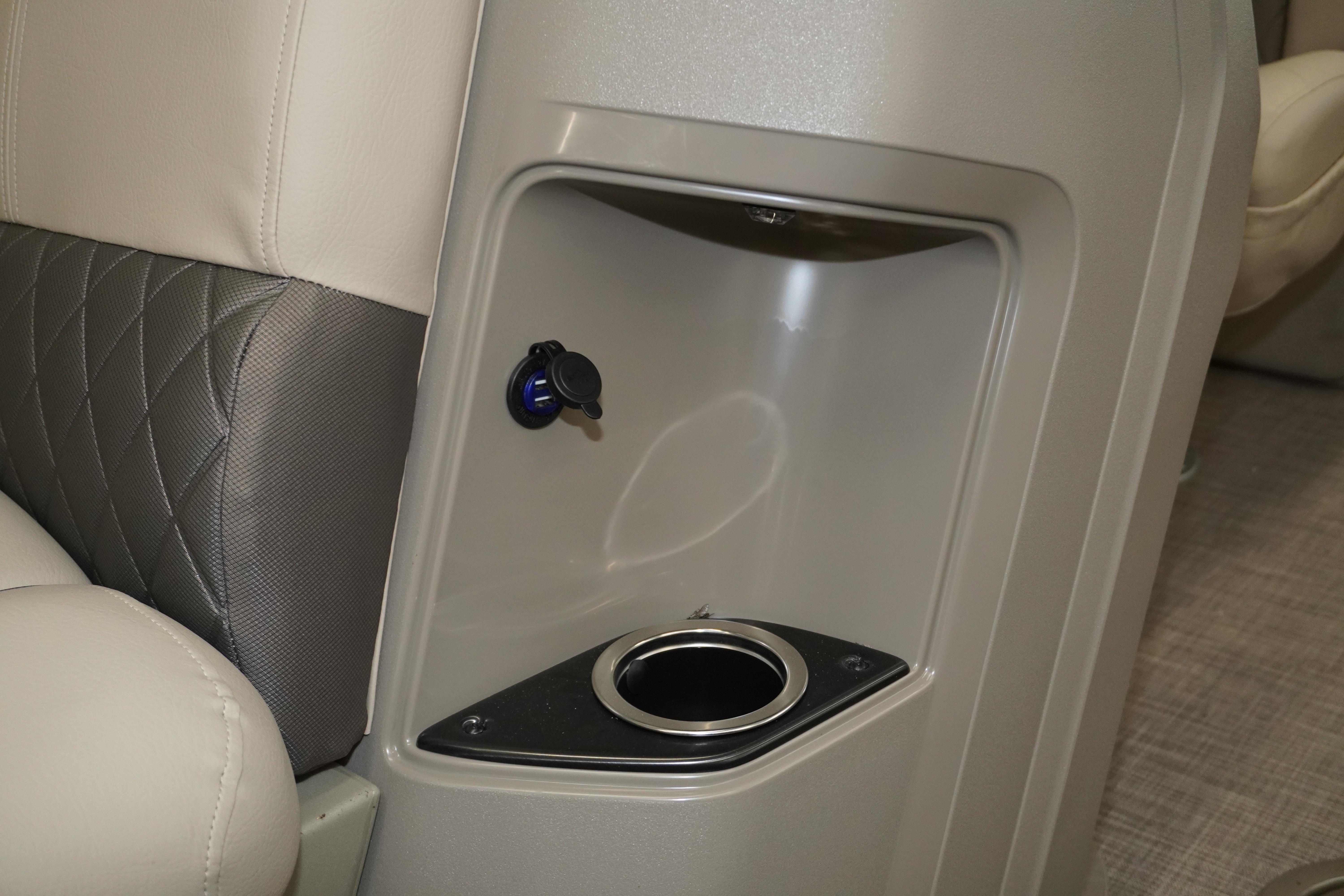 2024 Sun Tracker Party Barge 22 XP3 interior cup holder and USB port detail.