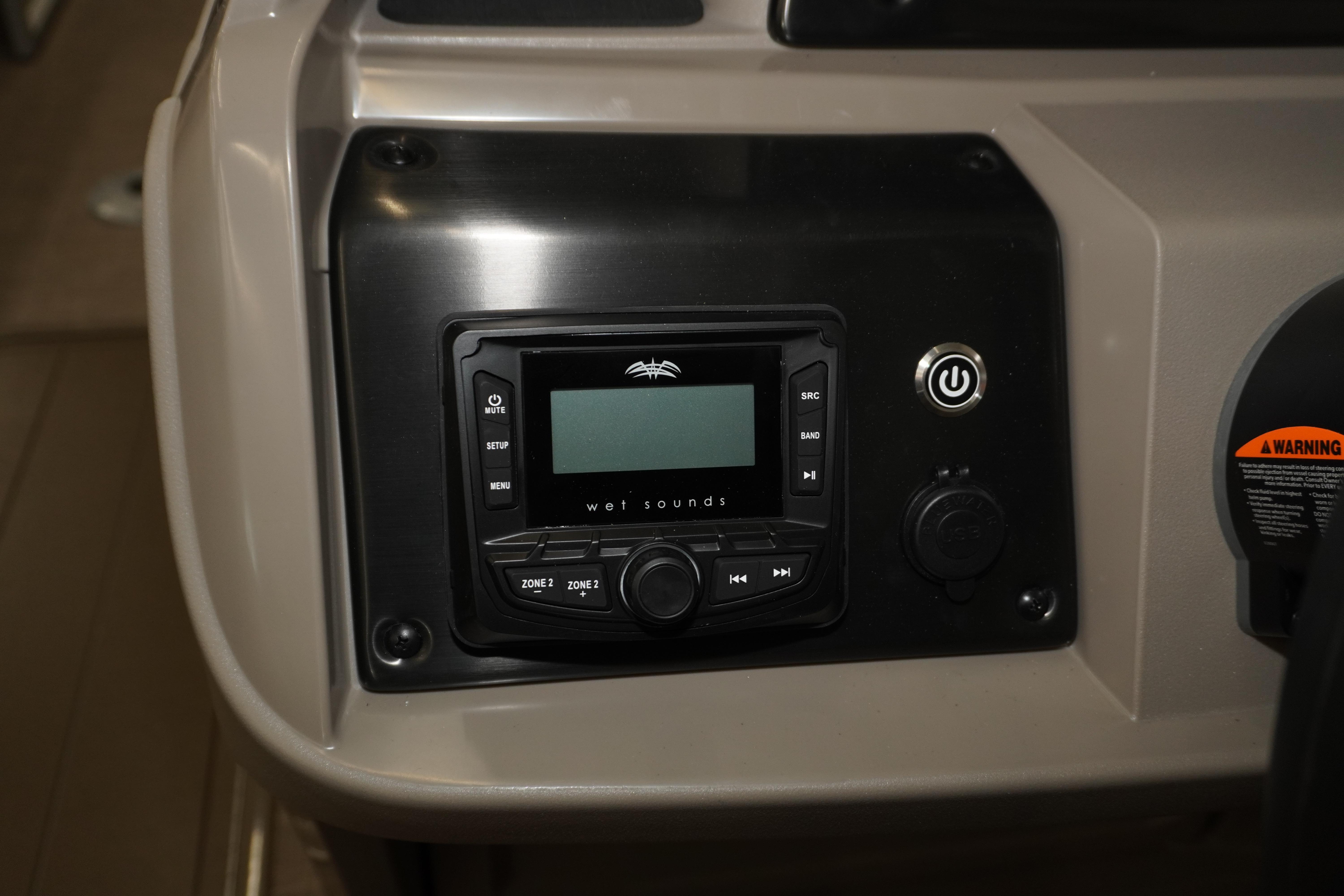 2024 Sun Tracker Party Barge 22 XP3 audio control panel with Wet Sounds system.