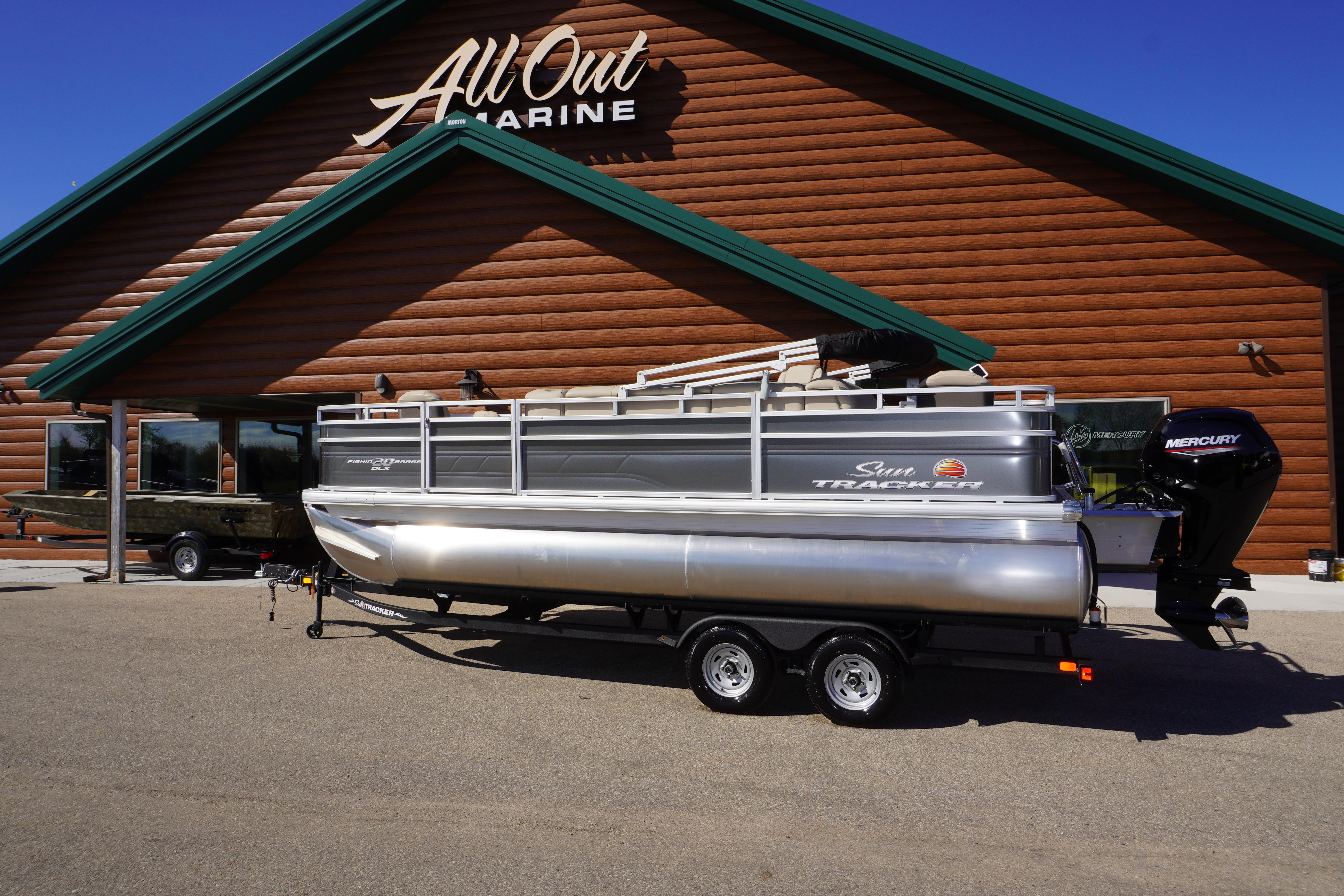 2024 Sun Tracker Fishin' Barge 20 DLX pontoon boat outside All Out Marine.