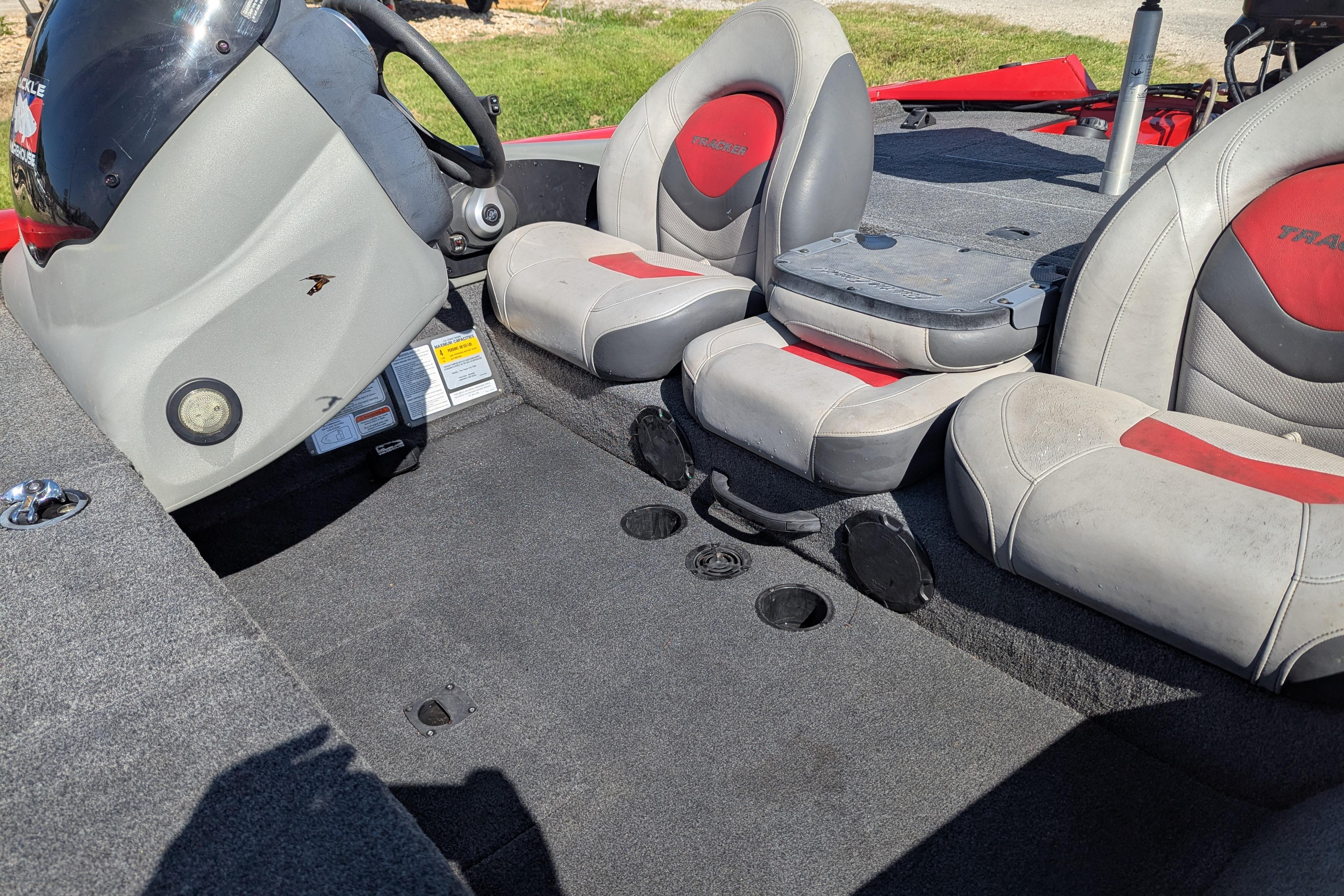 2015 Tracker Pro Team 175 TXW boat interior with steering console and seating.