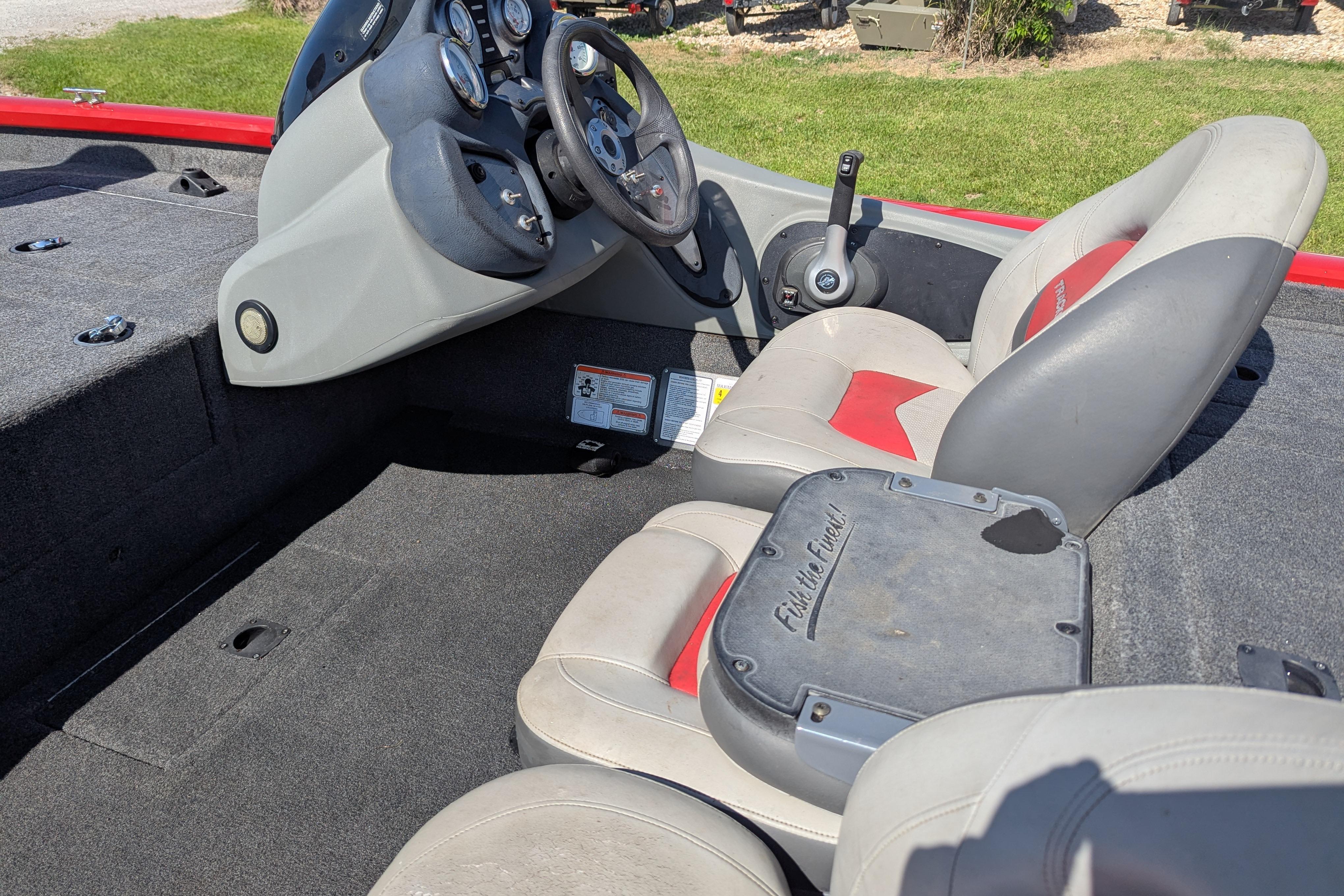 2015 Tracker Pro Team 175 TXW boat interior with steering console and seating.