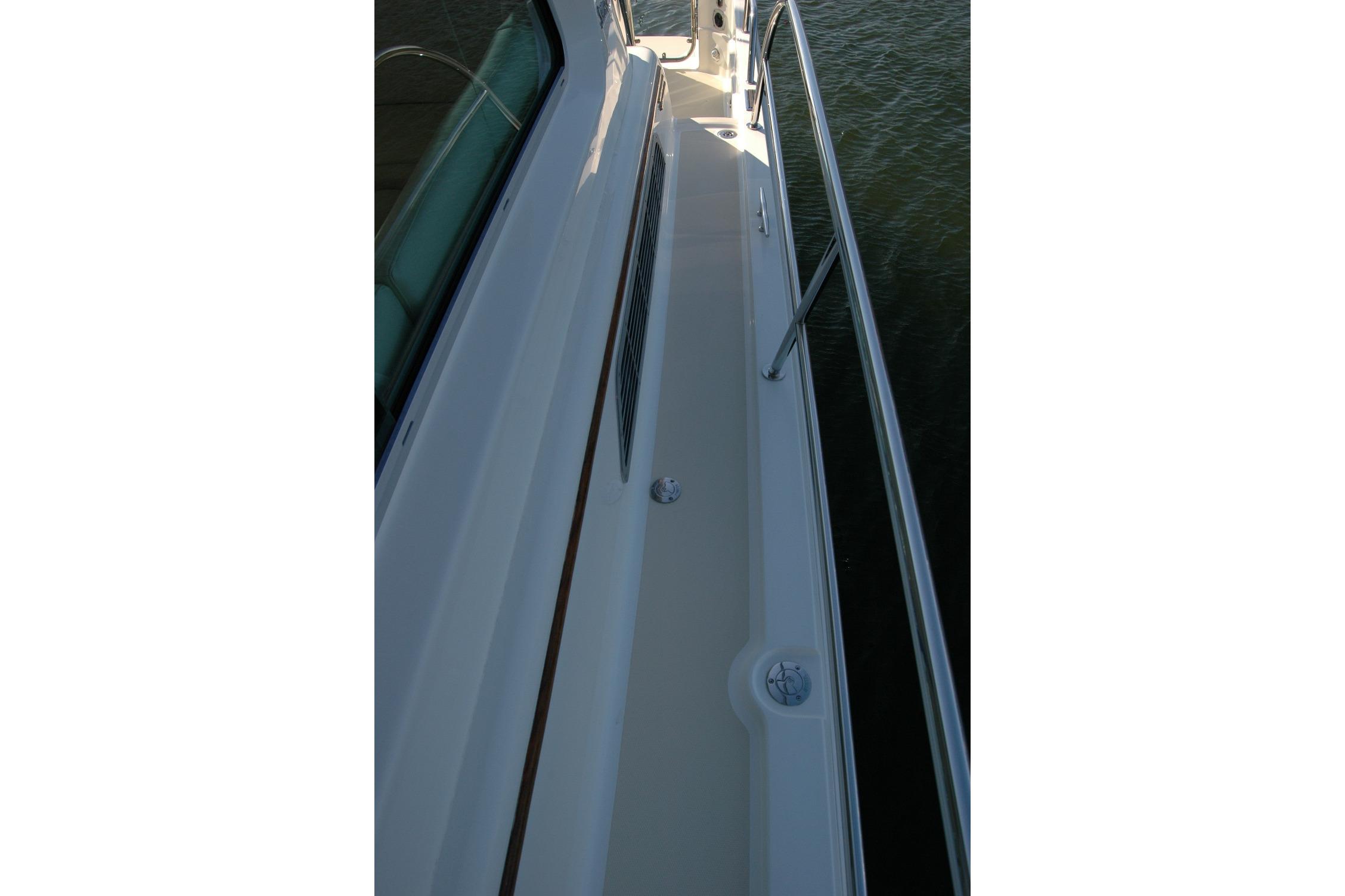 2019 Sabre 38 Salon Express deck view with railing and water backdrop.
