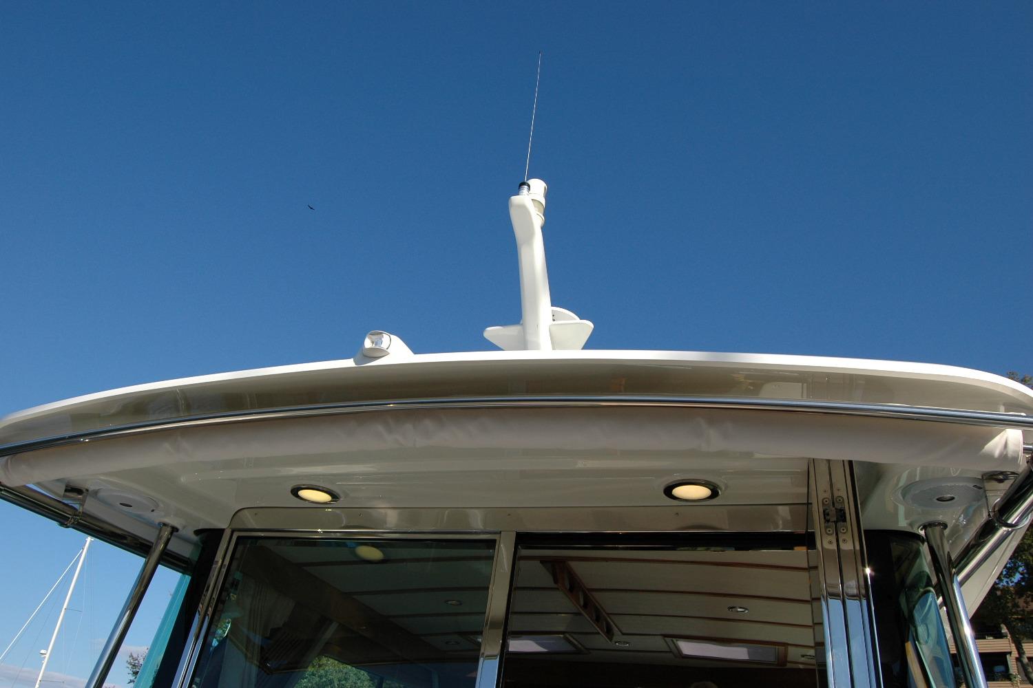 2019 Sabre 38 Salon Express yacht roof against clear blue sky.