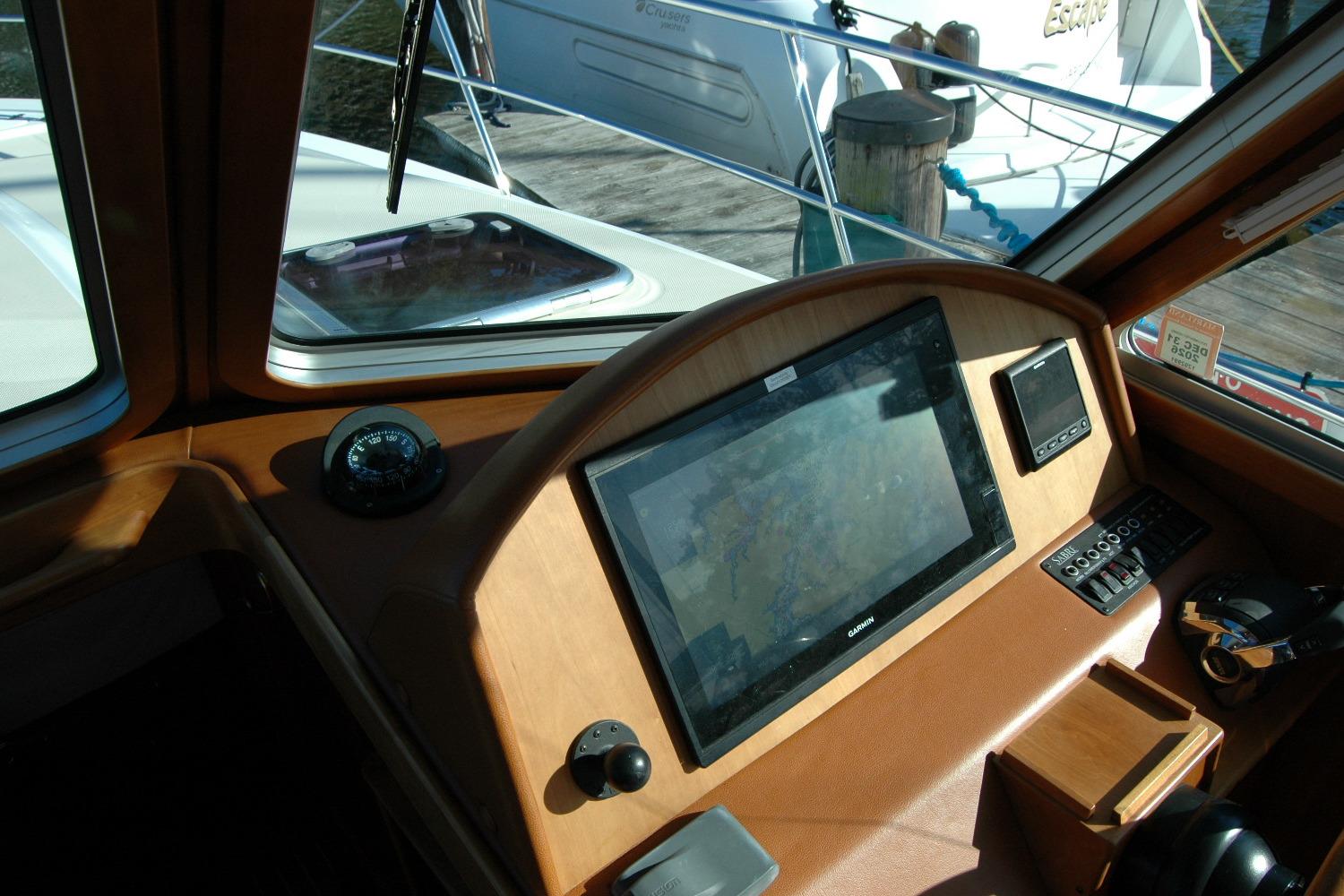 2019 Sabre 38 Salon Express helm with navigation display and controls.