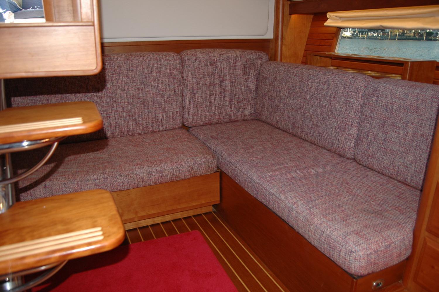 2019 Sabre 38 Salon Express interior with cozy seating and wooden accents.