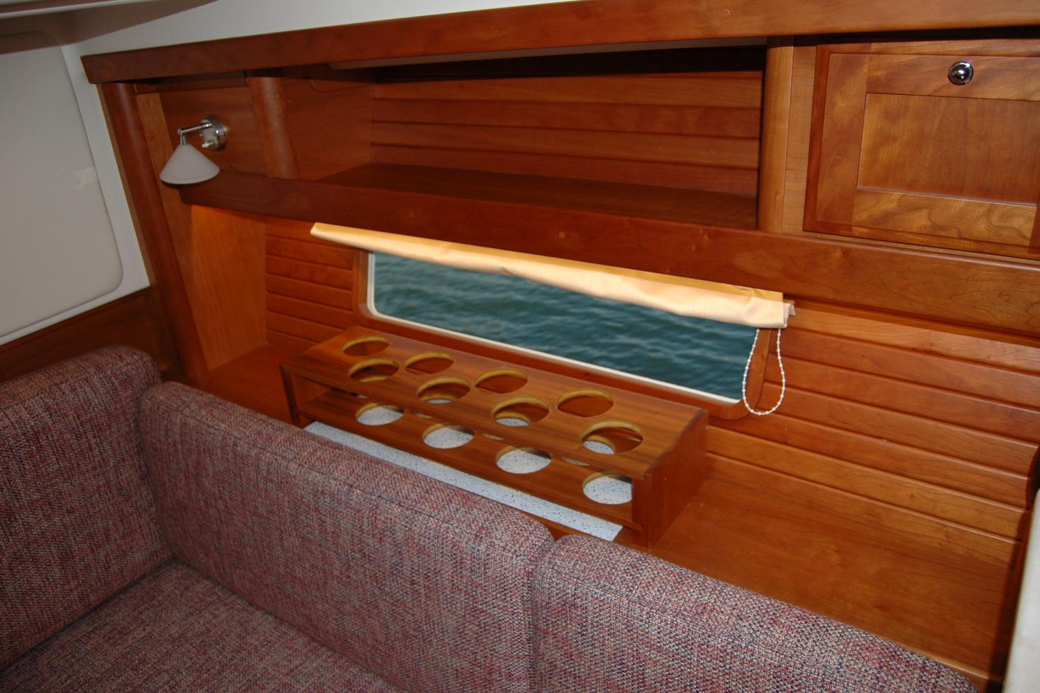 Interior of 2019 Sabre 38 Salon Express with wooden cabinetry and seating.