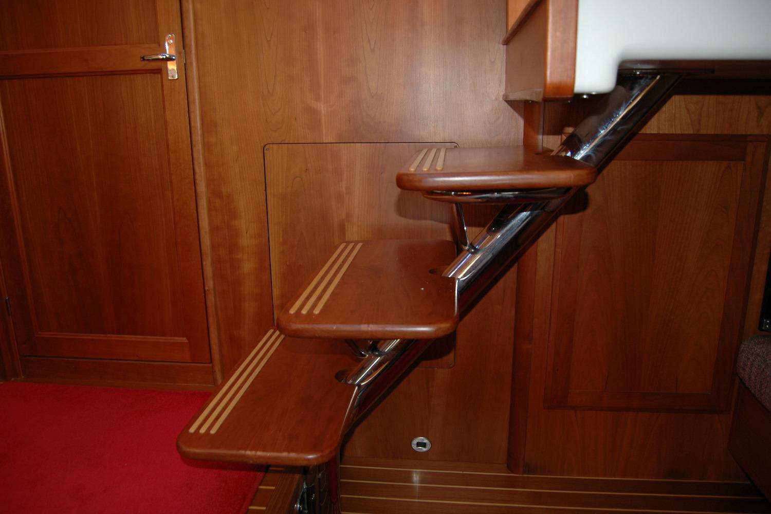 Wooden interior stairs on 2019 Sabre 38 Salon Express yacht.