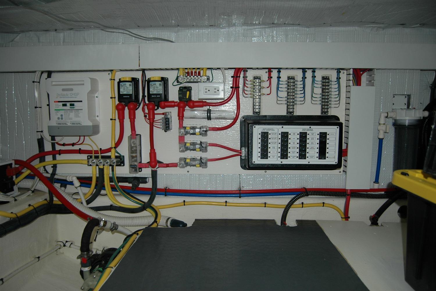 Electrical system of 2019 Sabre 38 Salon Express yacht, featuring wiring and control panels.