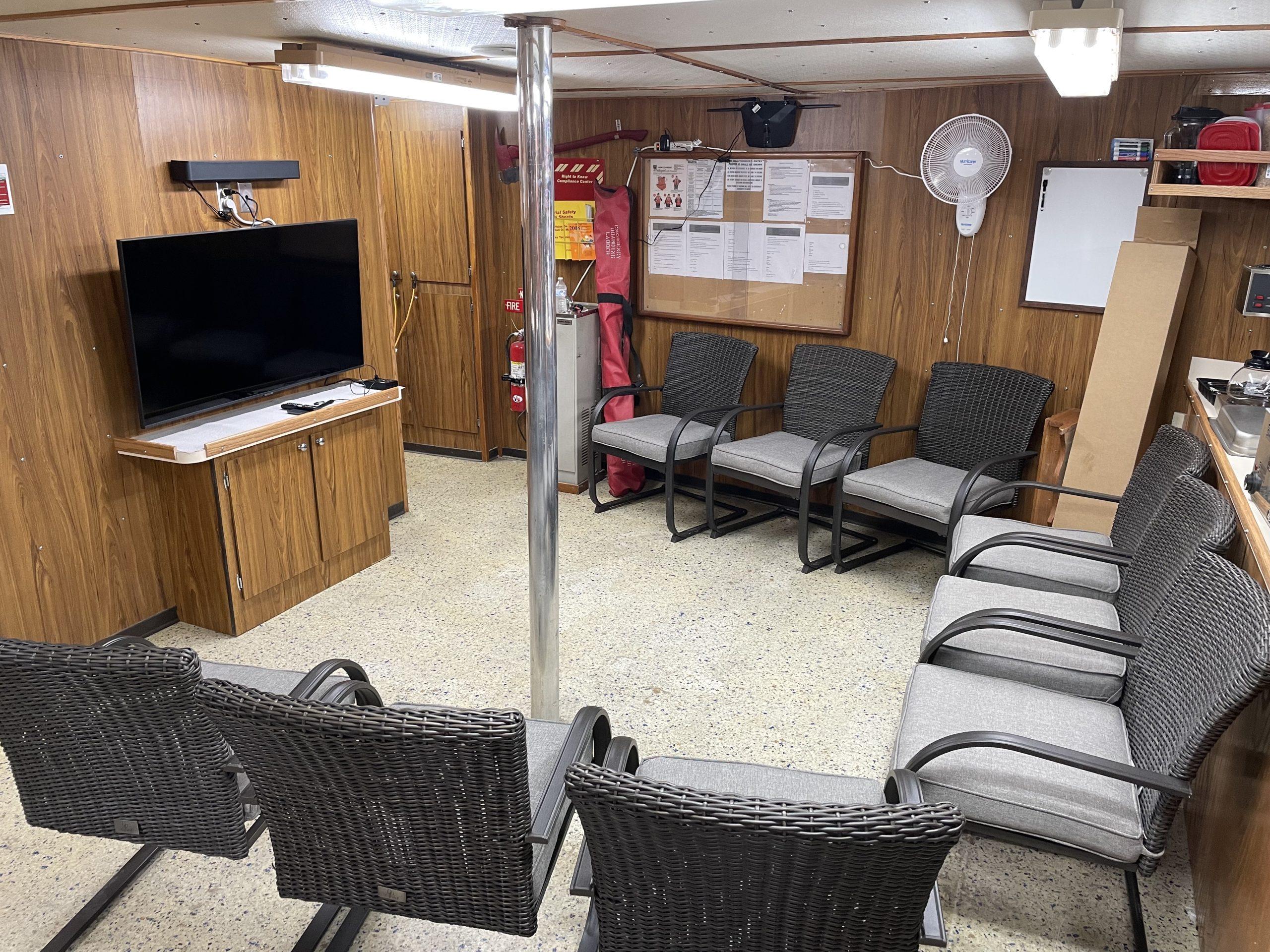 Custom-C & G Boat Works High Speed Supply Vessel 2002-VISION FL-US-Crew lounge on 2002 custom offshore supply vessel with chairs, TV, and safety equipment.-9686575 | Thumbnail
