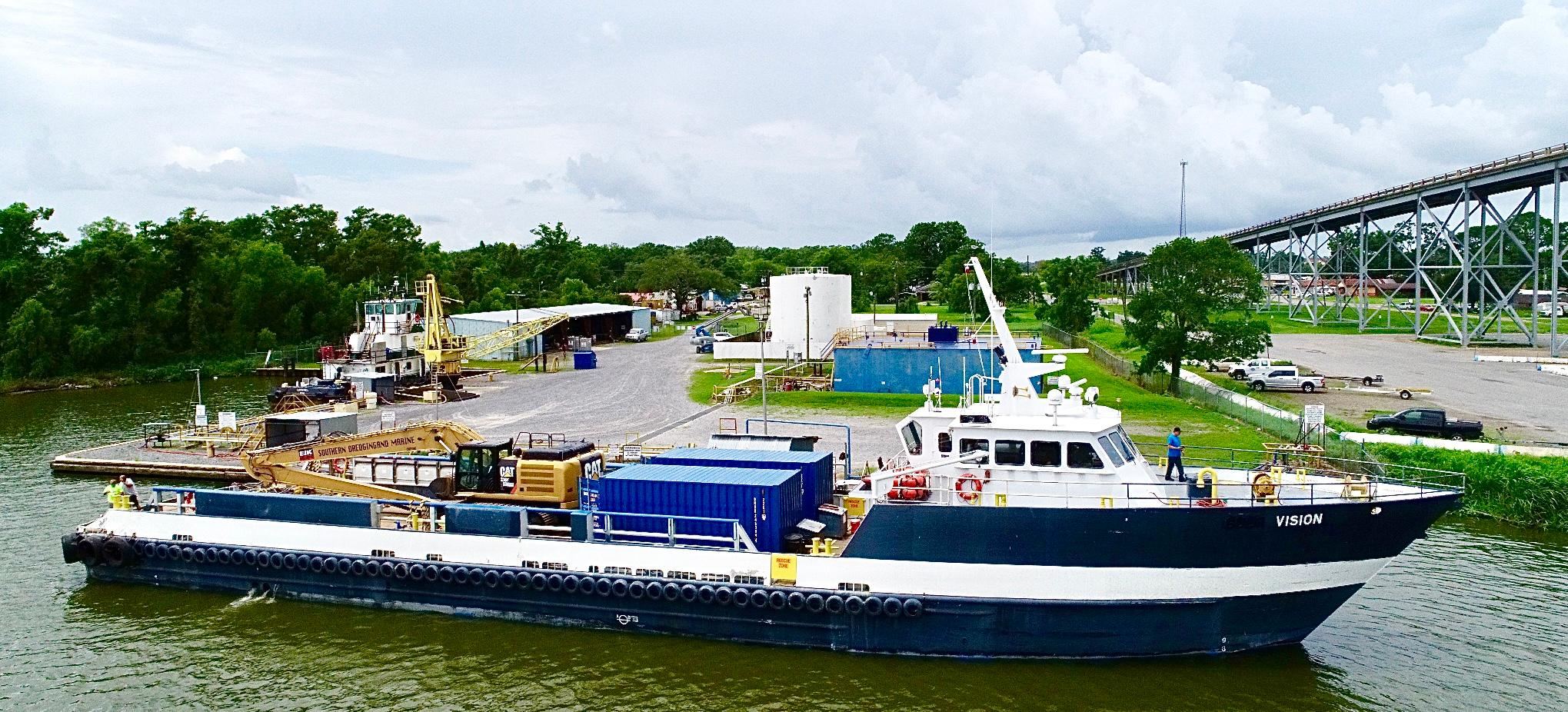 Custom-C & G Boat Works High Speed Supply Vessel 2002-VISION FL-US-Custom Offshore Supply Vessel, 2002, docked near a lush riverside industrial area.-9686575