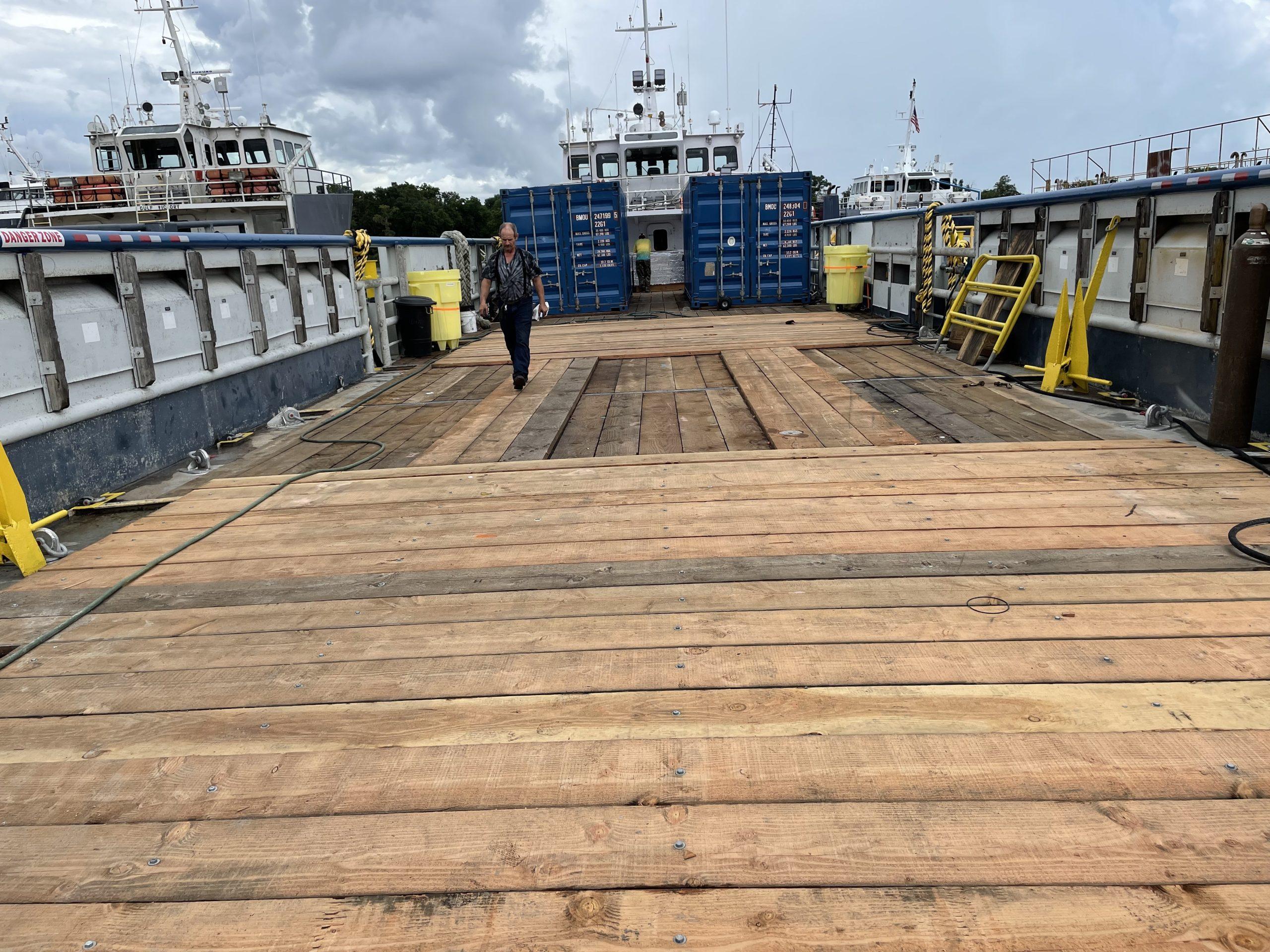 Custom-C & G Boat Works High Speed Supply Vessel 2002-VISION FL-US-Wooden deck of a 2002 custom offshore supply vessel with containers and equipment.-9686575 | Thumbnail