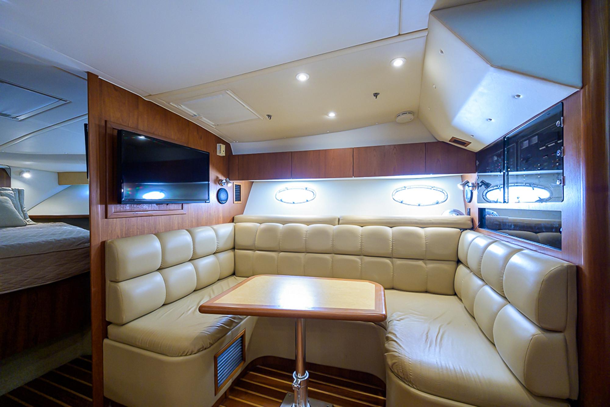 Tiara Yachts 35 Dorado - Interior photo of table with seating