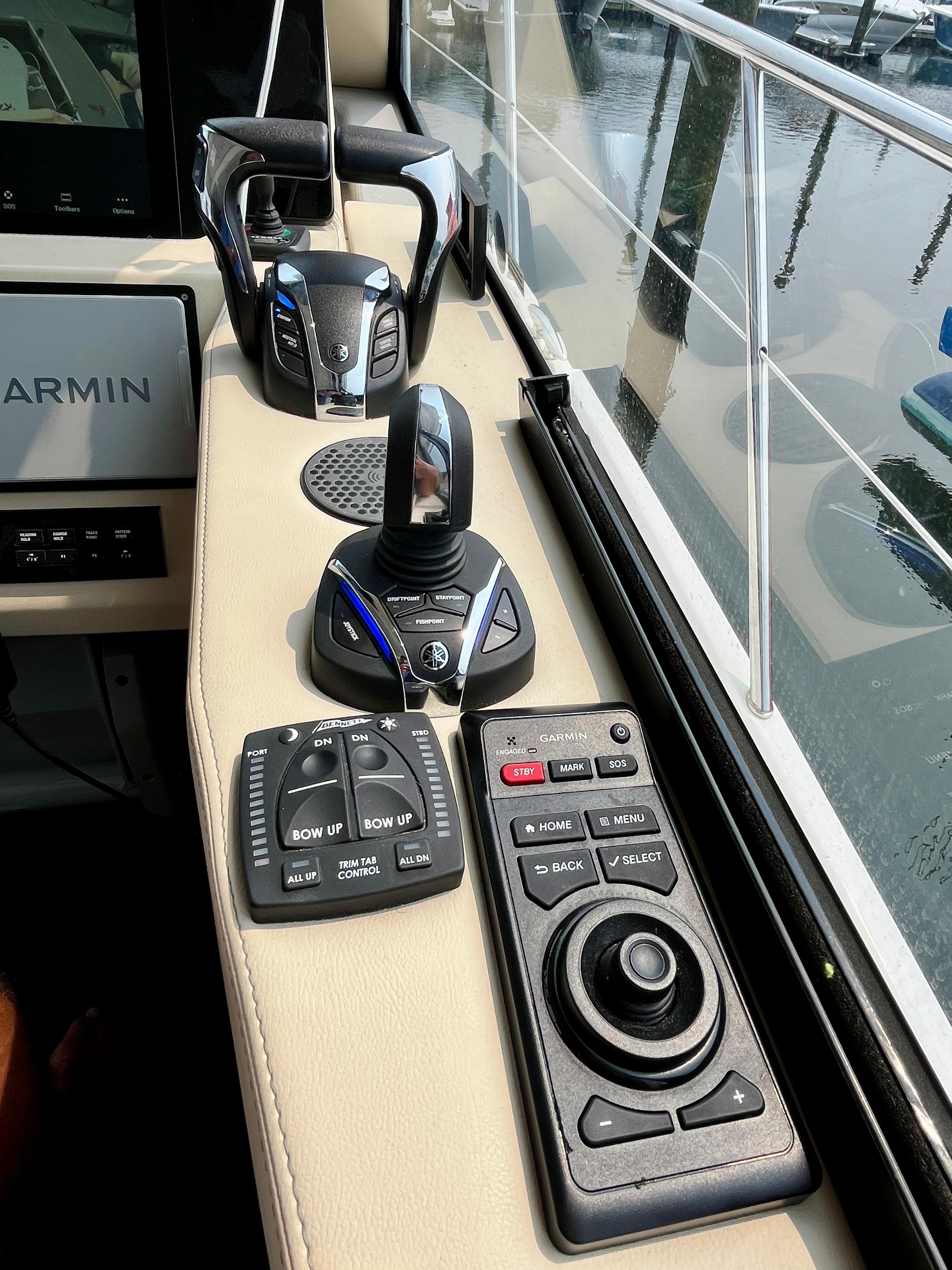 Control panel of 2022 Regal 38 XO boat with Garmin navigation system.