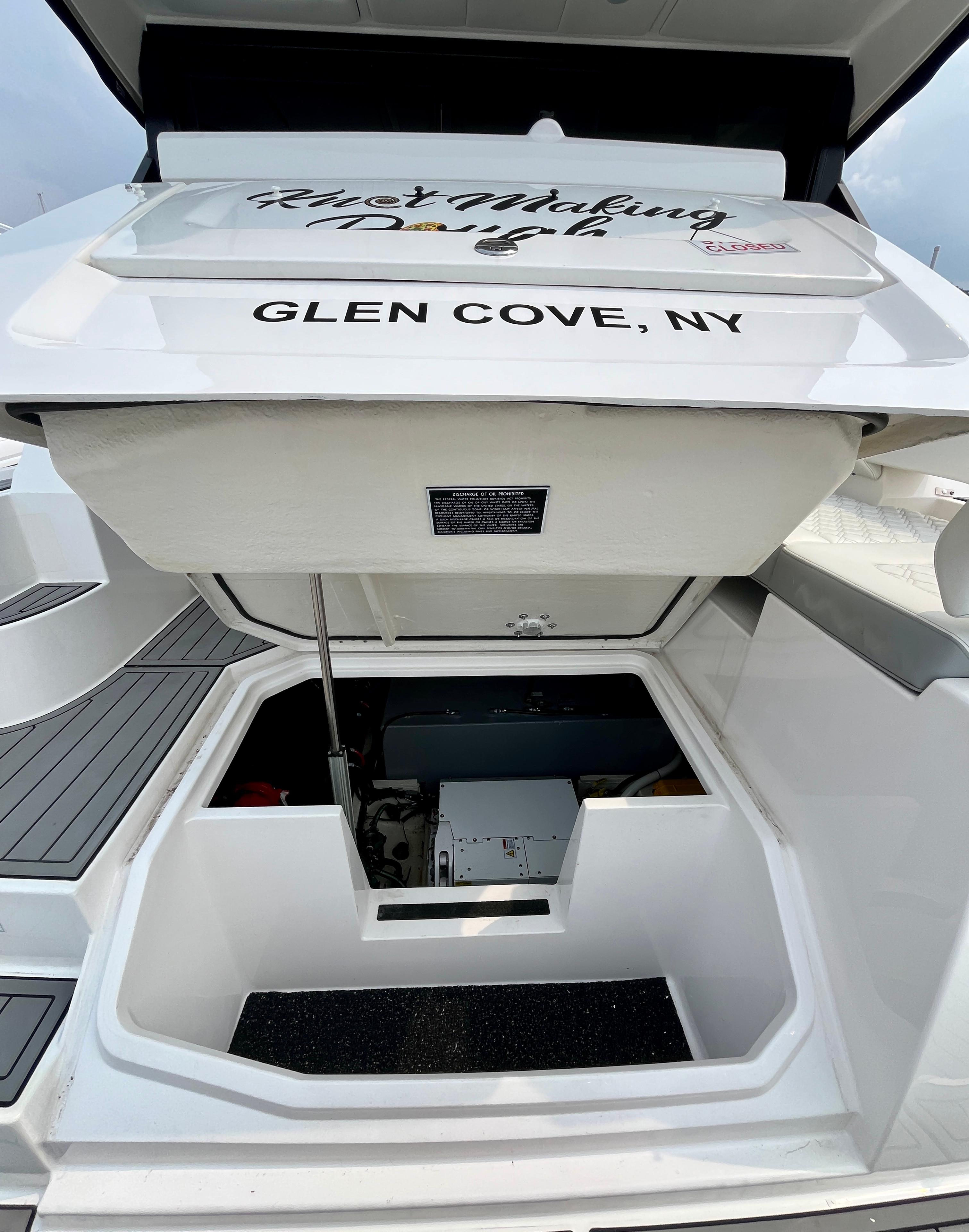 2022 Regal 38 XO yacht with open storage compartment, Glen Cove, NY.