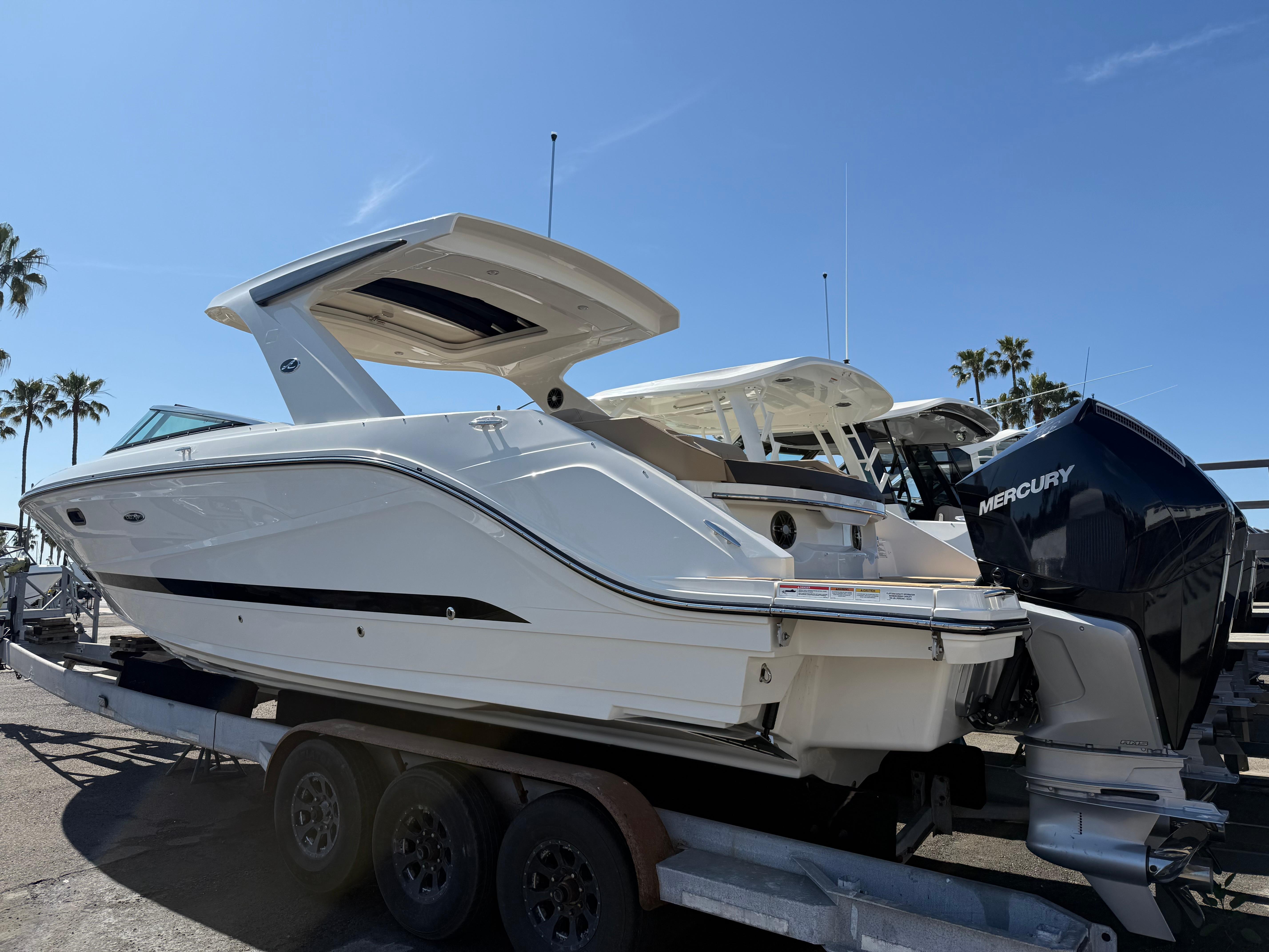 2025 Sea Ray SLX 310 Outboard #S1677A inventory image at Sun Country Marine Group, Newport Beach 2025 Sea Ray SLX 310 Outboard #S1677A inventory image at Sun Country Marine Group, Newport Beach