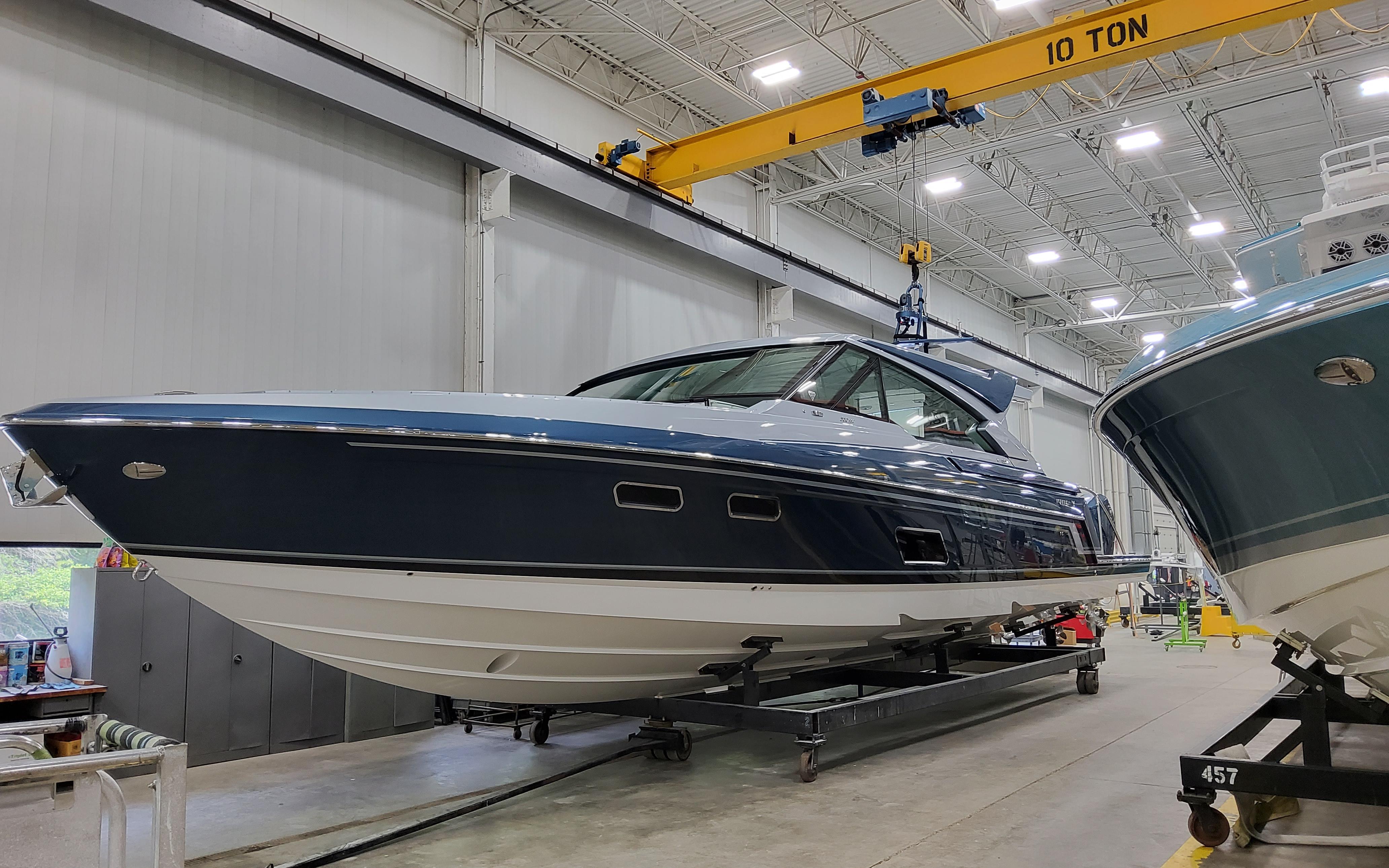 2026 Formula 500 Super Sport Crossover boat in a manufacturing facility.