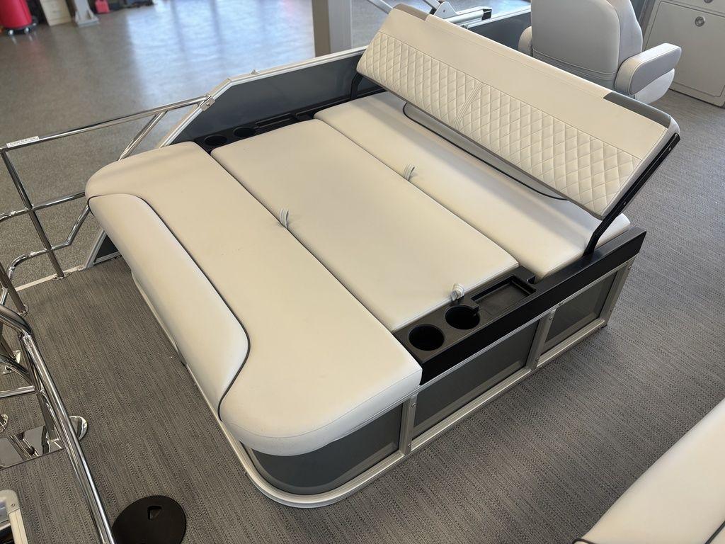 2025 Godfrey Sweetwater 2286 SFLC boat with luxurious white seating and cup holders.