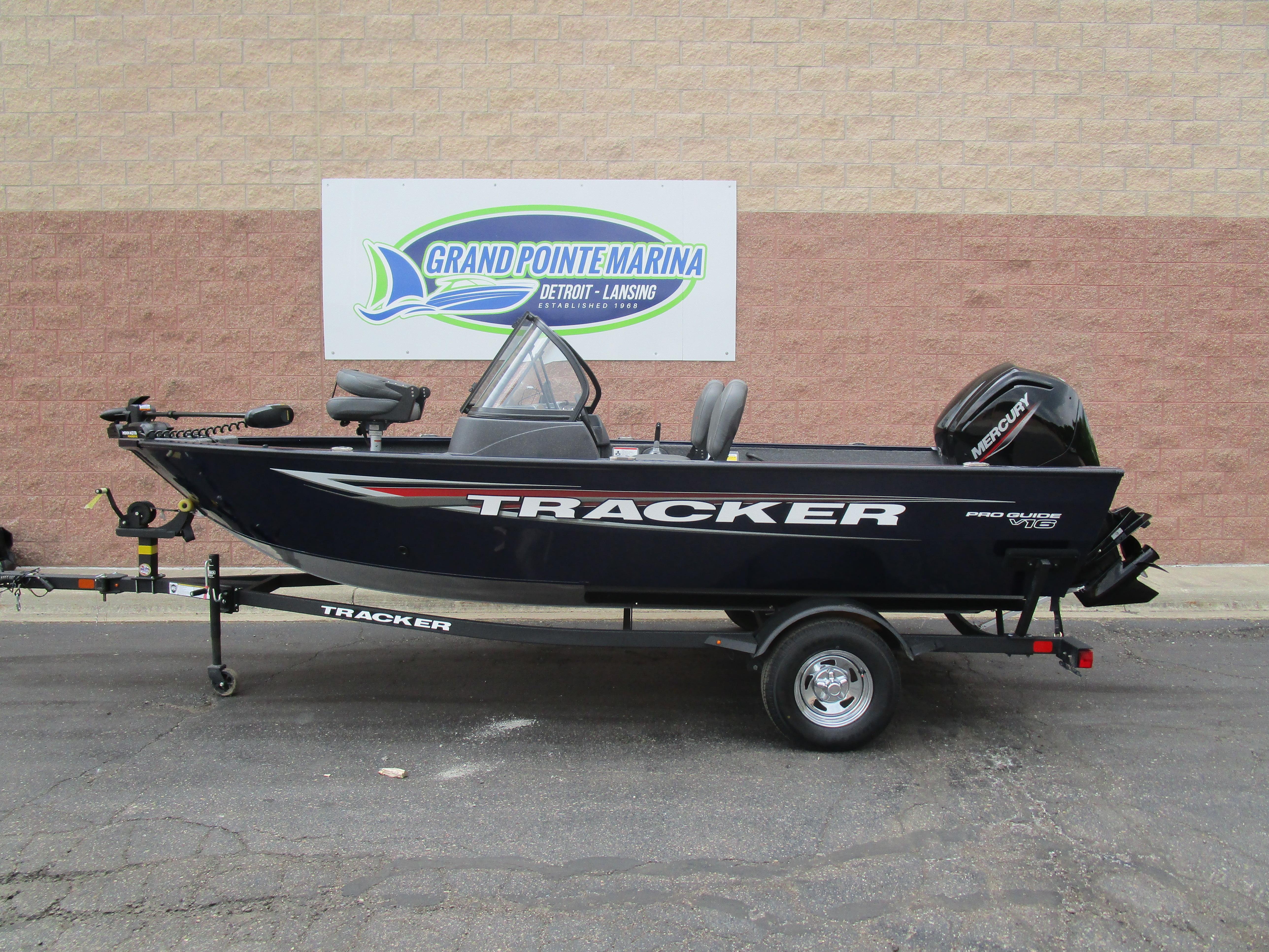2025 Tracker Pro Guide V16 WT boat on trailer at Grand Pointe Marina.