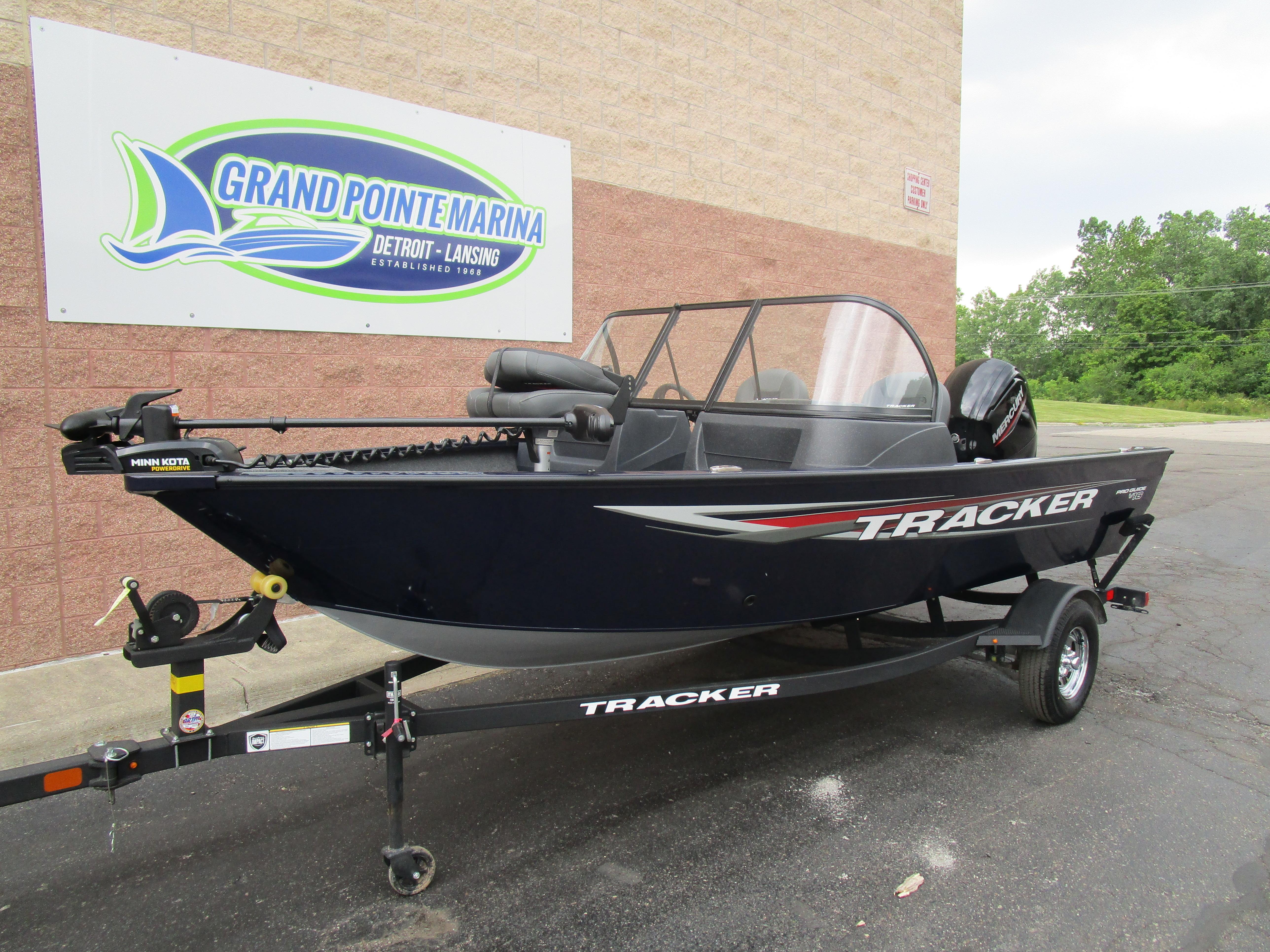 2025 Tracker Pro Guide V16 WT boat on trailer at Grand Pointe Marina.