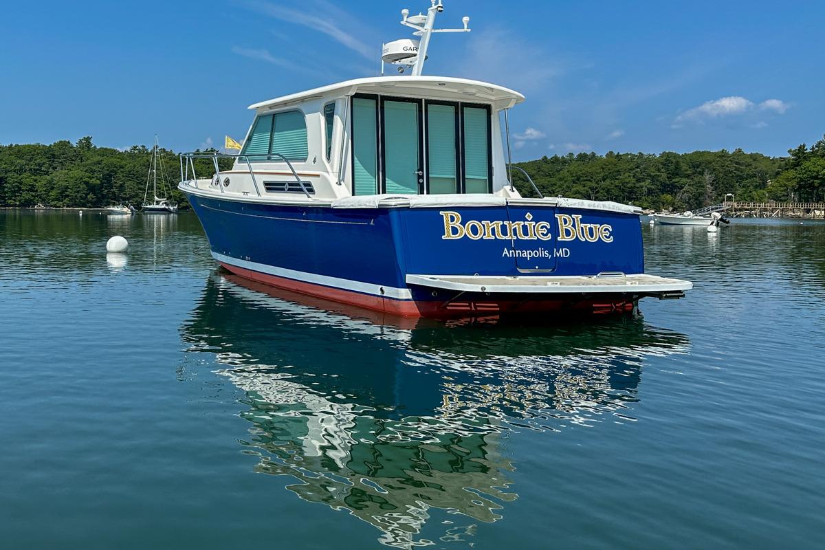 2015 Back Cove 37 boat named u0022Bonnie Blueu0022 on calm water in Annapolis, MD.