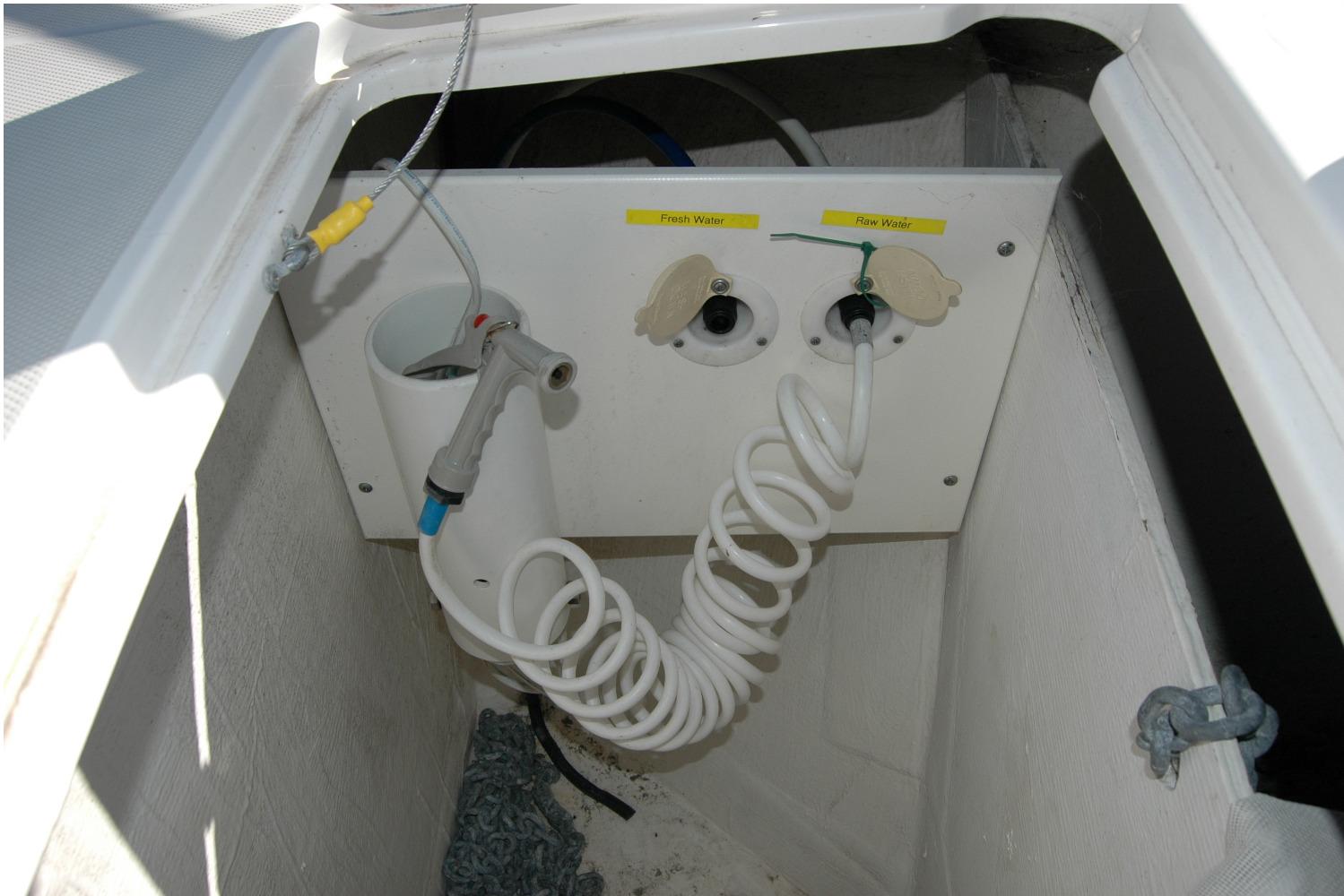 Fresh and raw water connections on a 2015 Back Cove 37 boat.