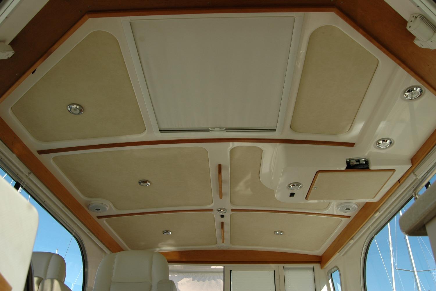Interior ceiling of a 2015 Back Cove 37 boat with recessed lighting.