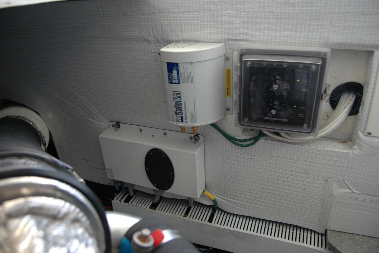 Engine room of 2015 Back Cove 37 boat with electrical components and wiring.