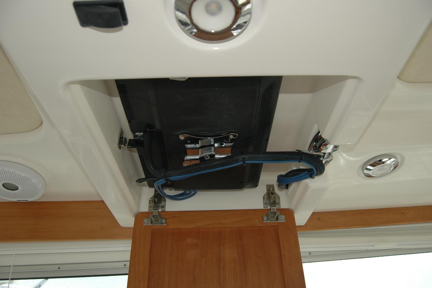 Ceiling-mounted equipment in a 2015 Back Cove 37 boat interior.