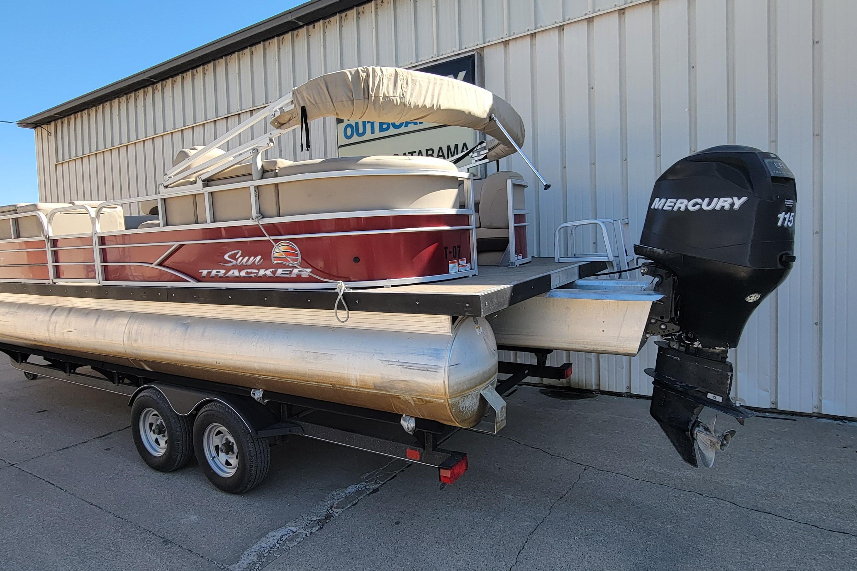 2019 Sun Tracker Party Barge 24 DLX pontoon boat with Mercury 115 outboard motor.