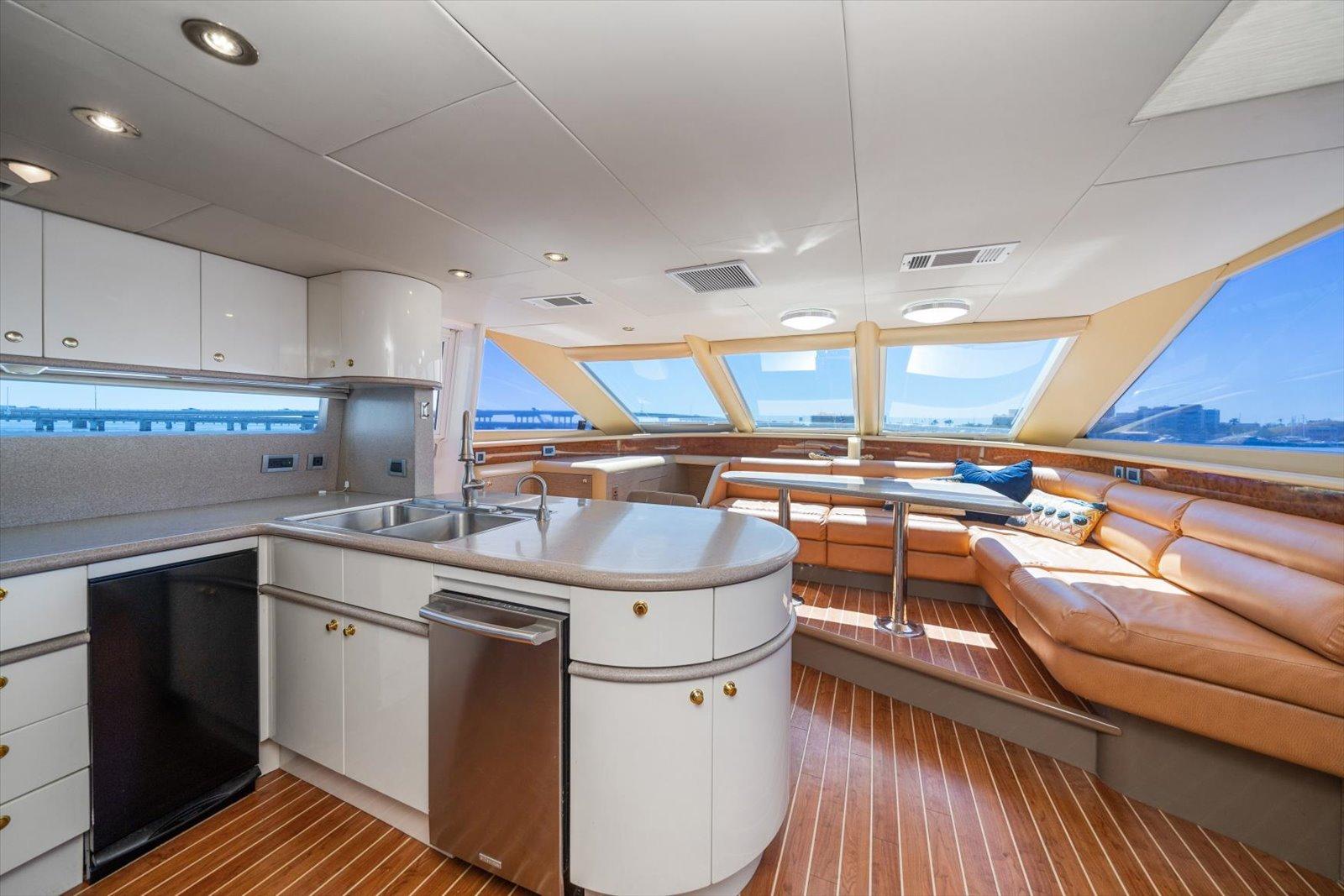 Lazzara-EB 76 1997-Octopi FL-US-Luxurious interior of 1997 Lazzara EB 76 yacht with modern kitchen and seating area.-9736767 | Thumbnail