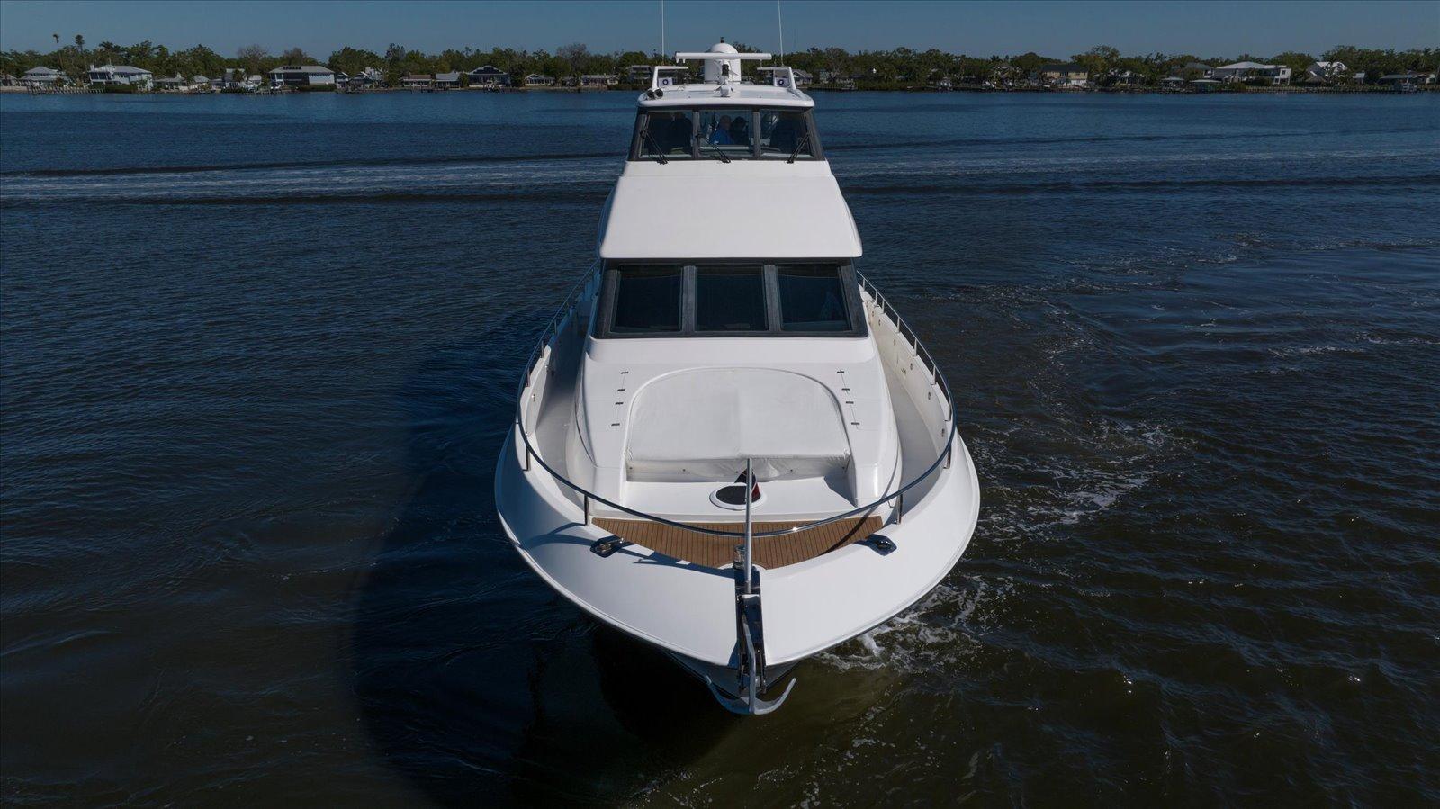 Lazzara-EB 76 1997-Octopi FL-US-Front view of a 1997 Lazzara EB 76 yacht cruising on calm waters.-9736767 | Thumbnail