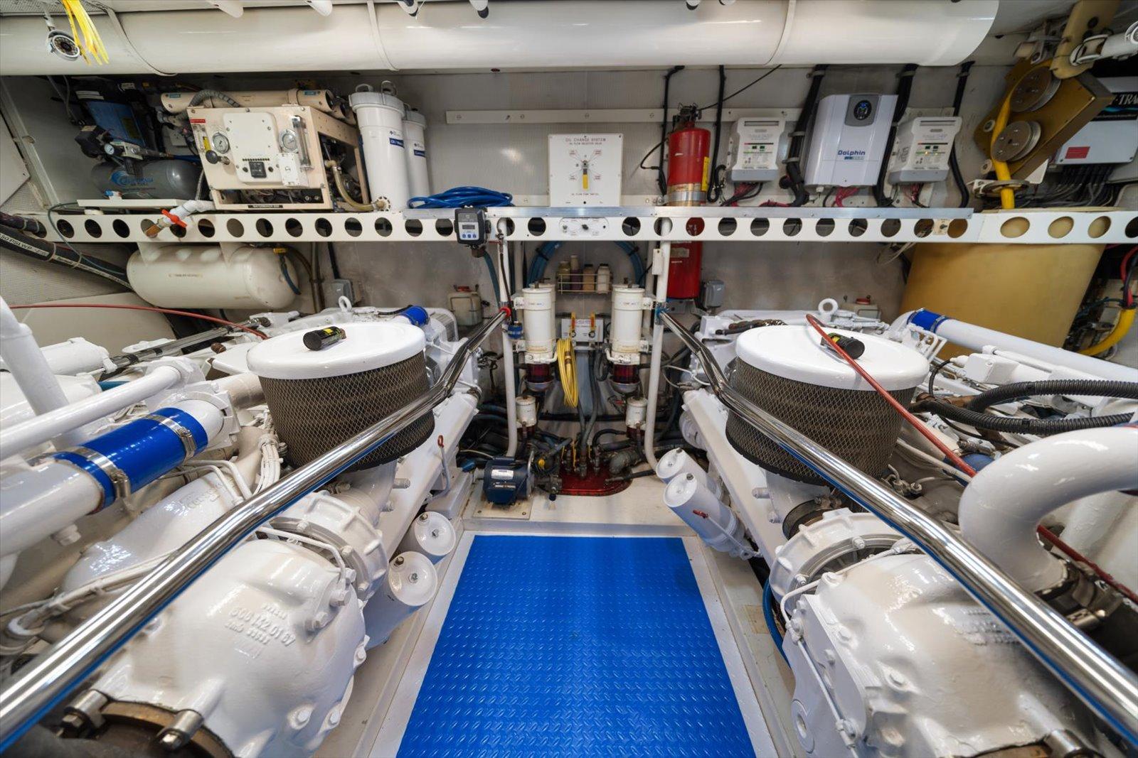 Lazzara-EB 76 1997-Octopi FL-US-Engine room of 1997 Lazzara EB 76 yacht, featuring dual engines and mechanical equipment.-9736767 | Thumbnail